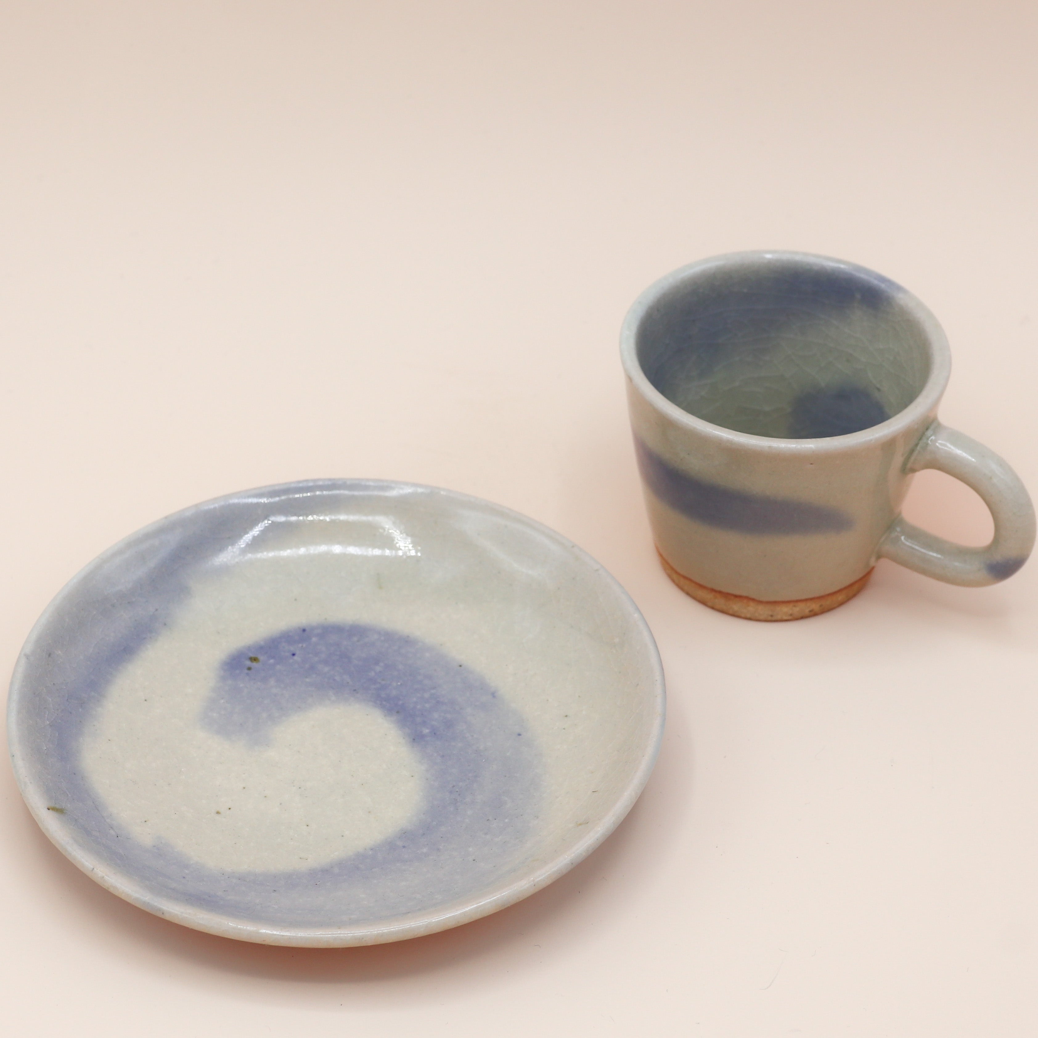 Kop med underkop i blå nuancer