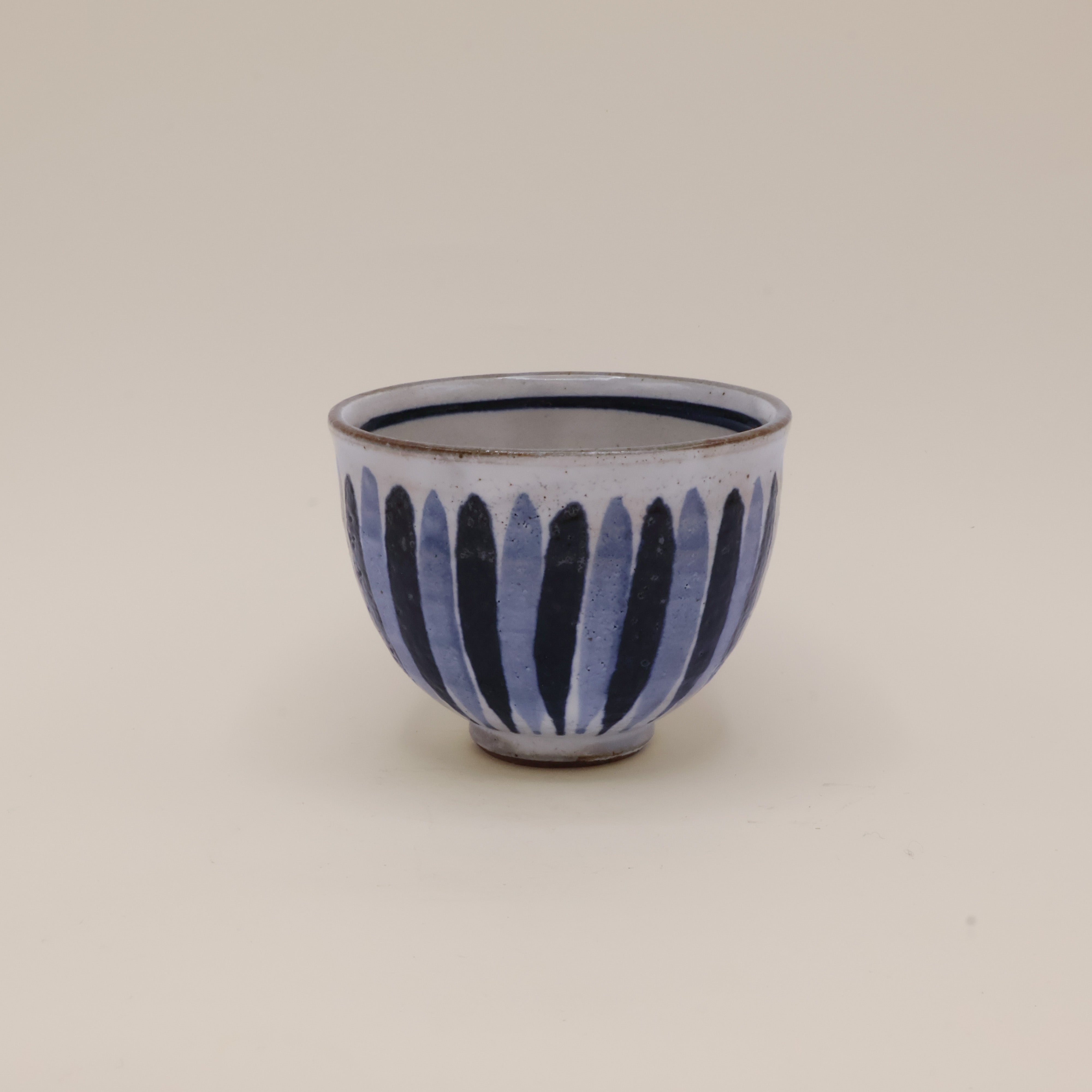 Handmade Japanese cup with blue stripes