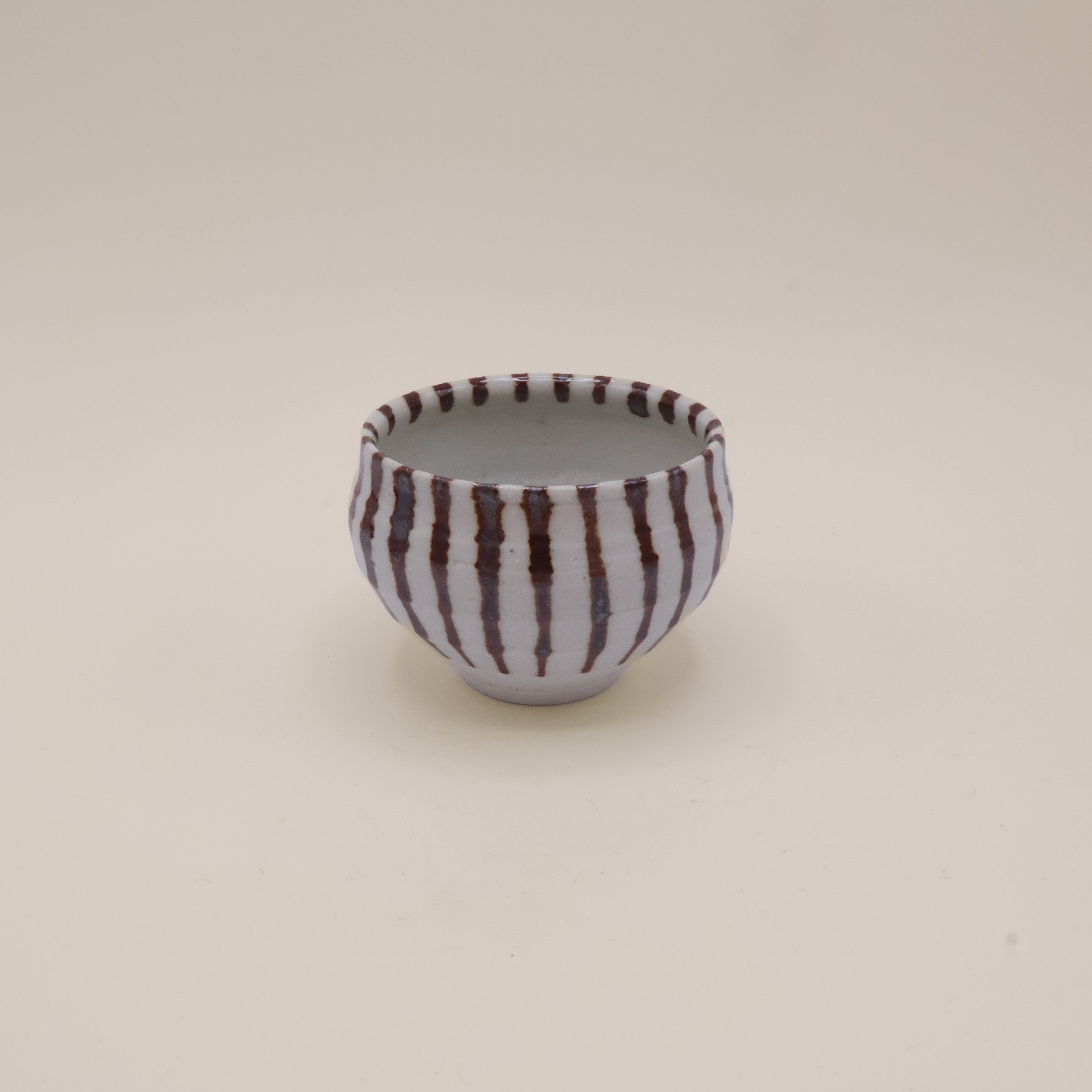 Japansk kop med metallisk brune striber