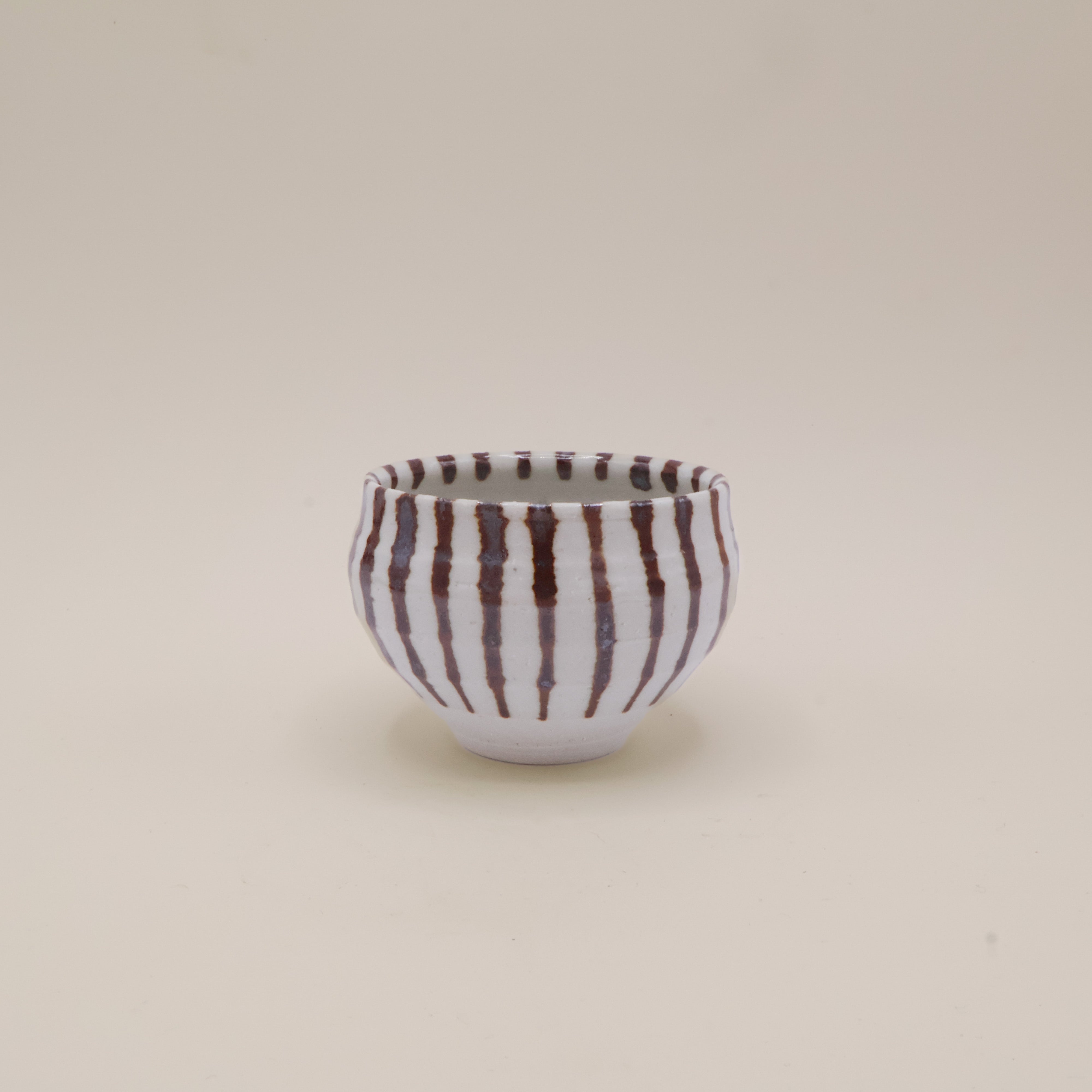 Japansk kop med metallisk brune striber