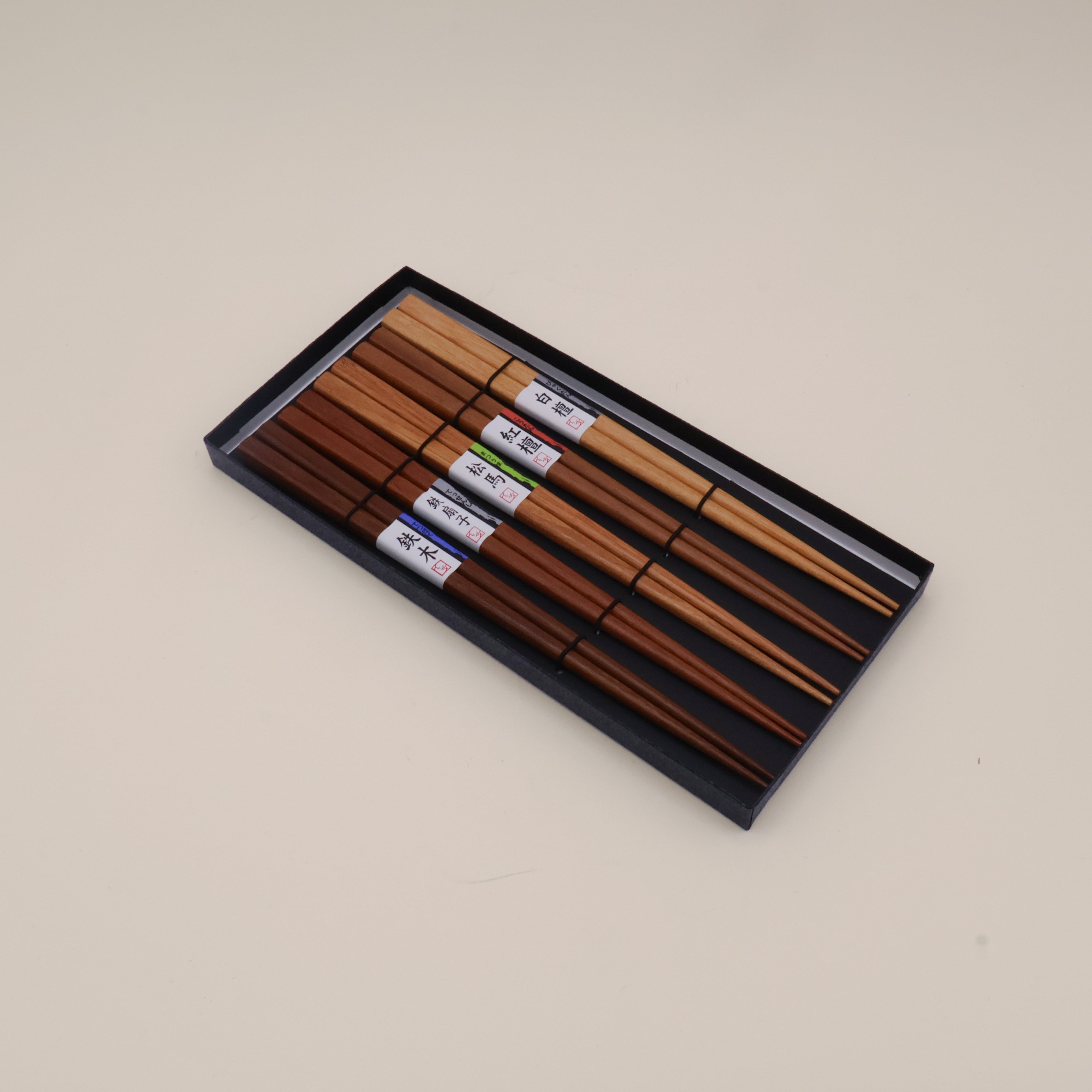 Chopsticks in different shades of wood