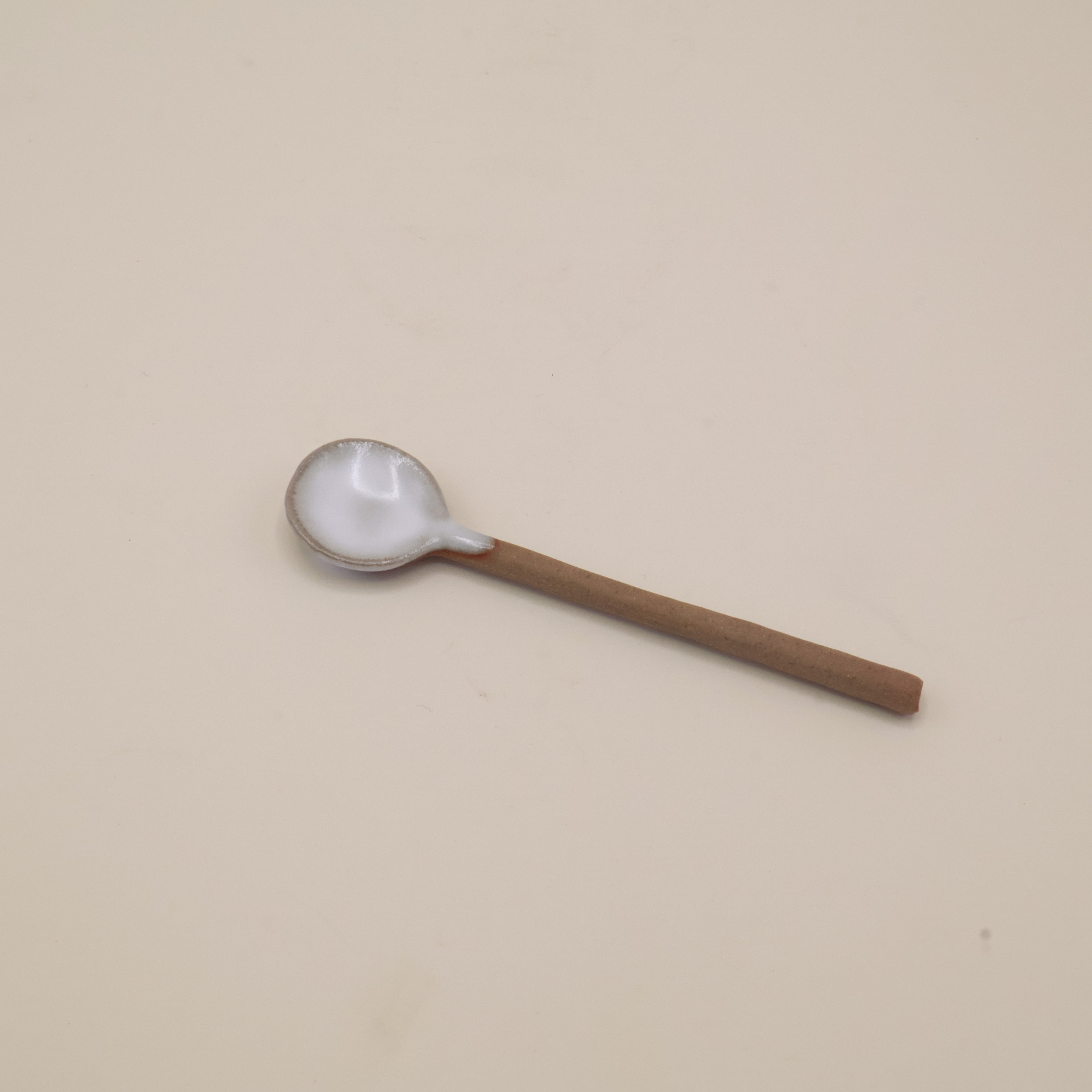 Ceramic spoon with white glaze