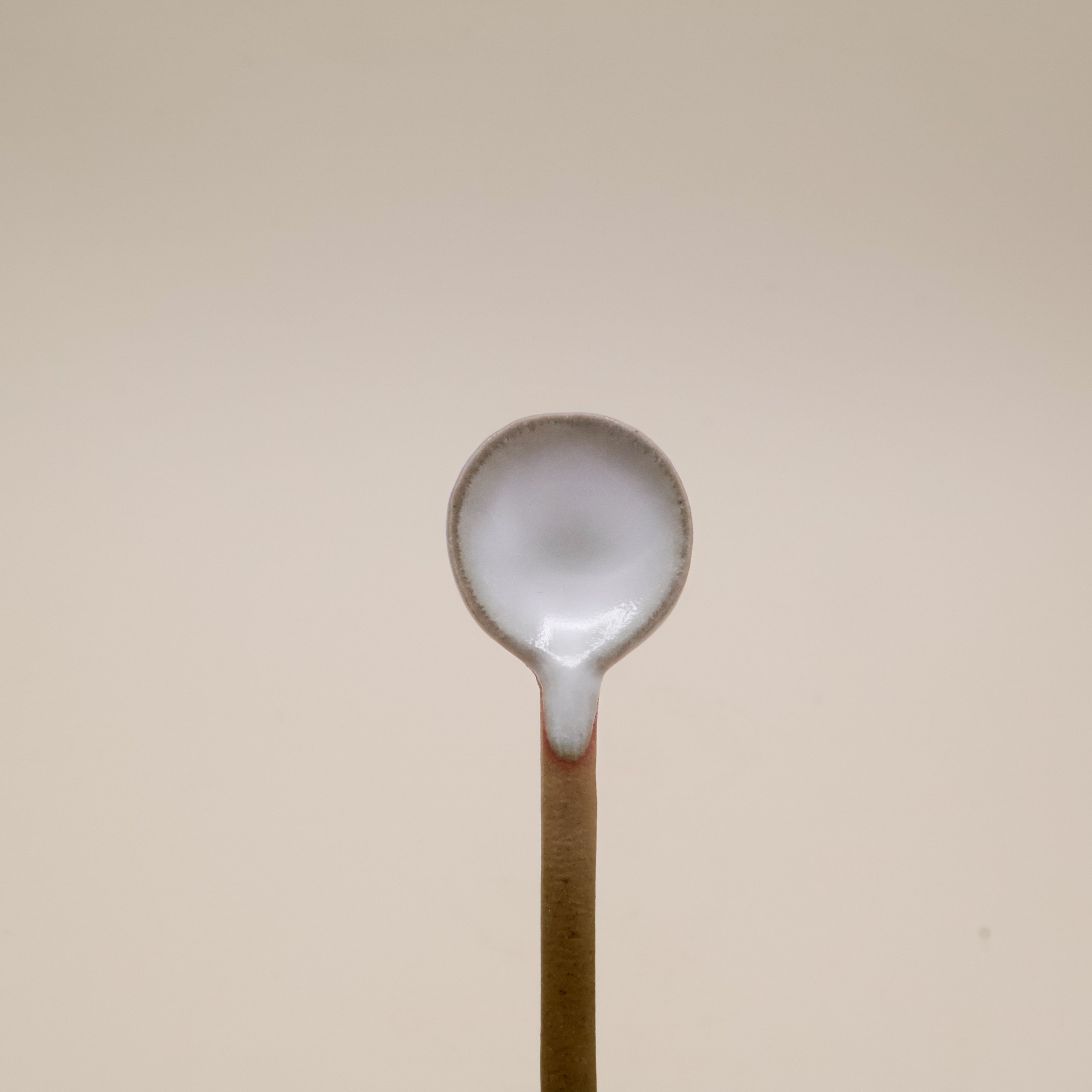 Ceramic spoon with white glaze