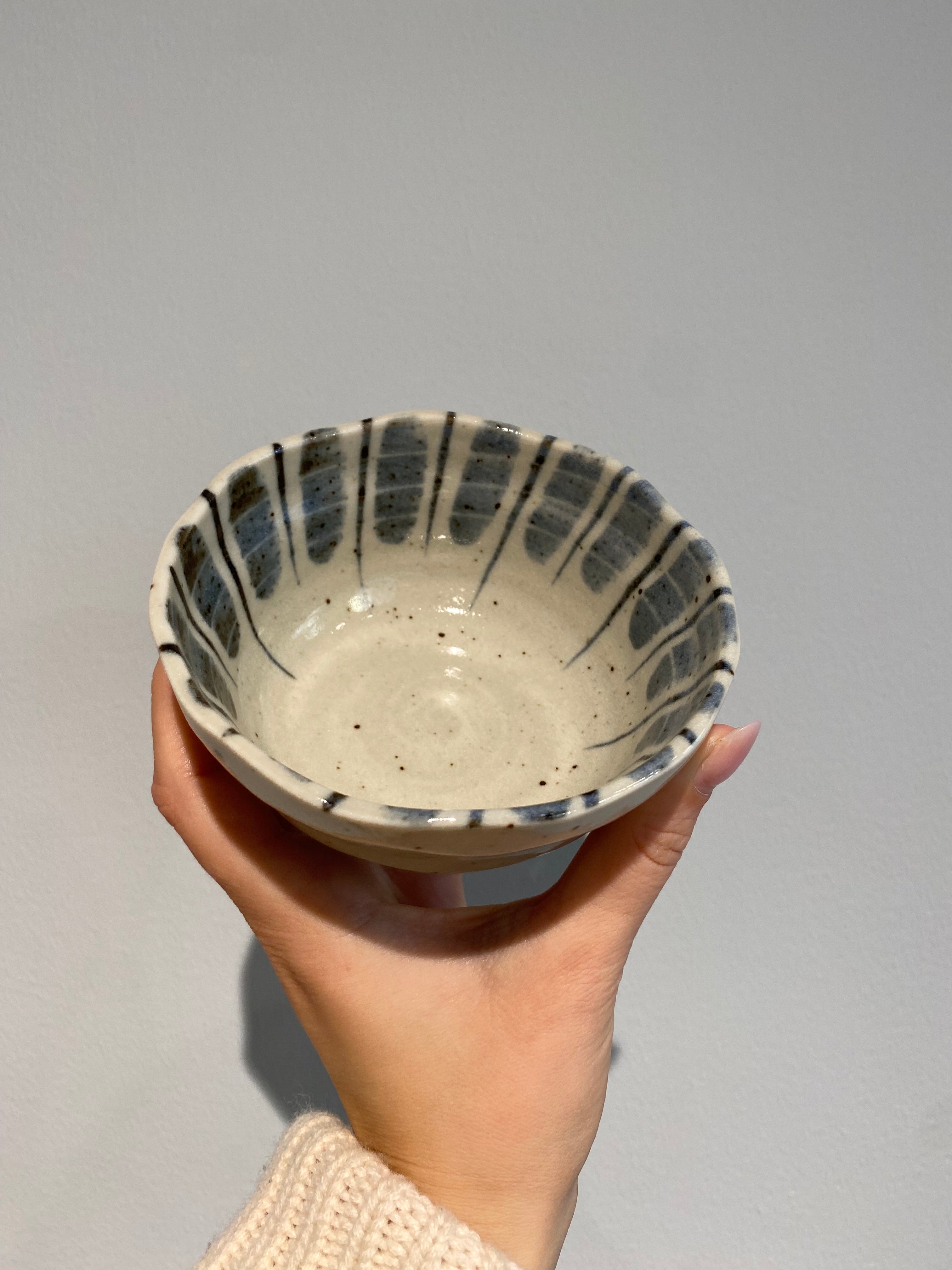 Bowl with blue and brown stripes and small dots