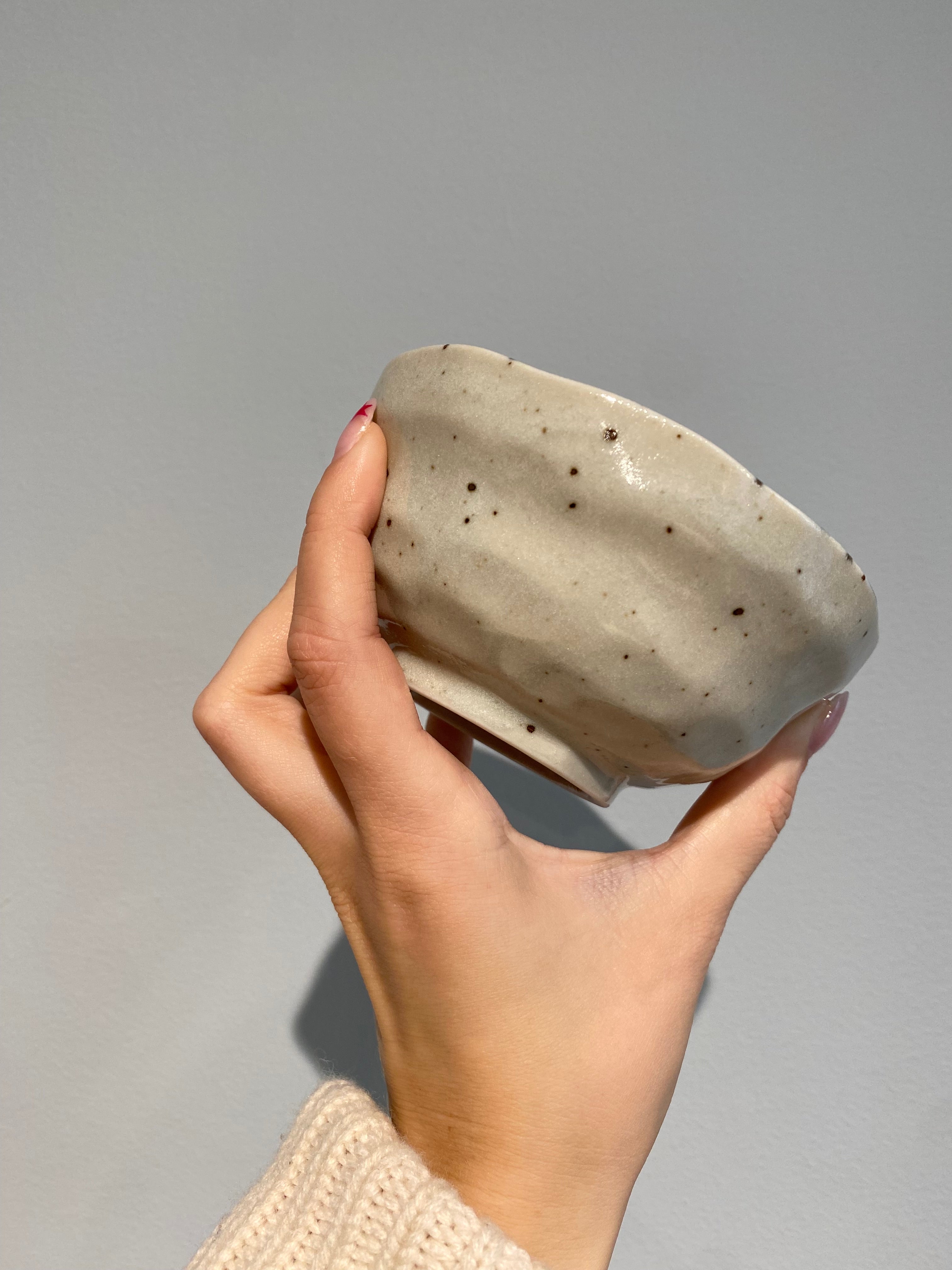 Bowl with blue and brown stripes and small dots