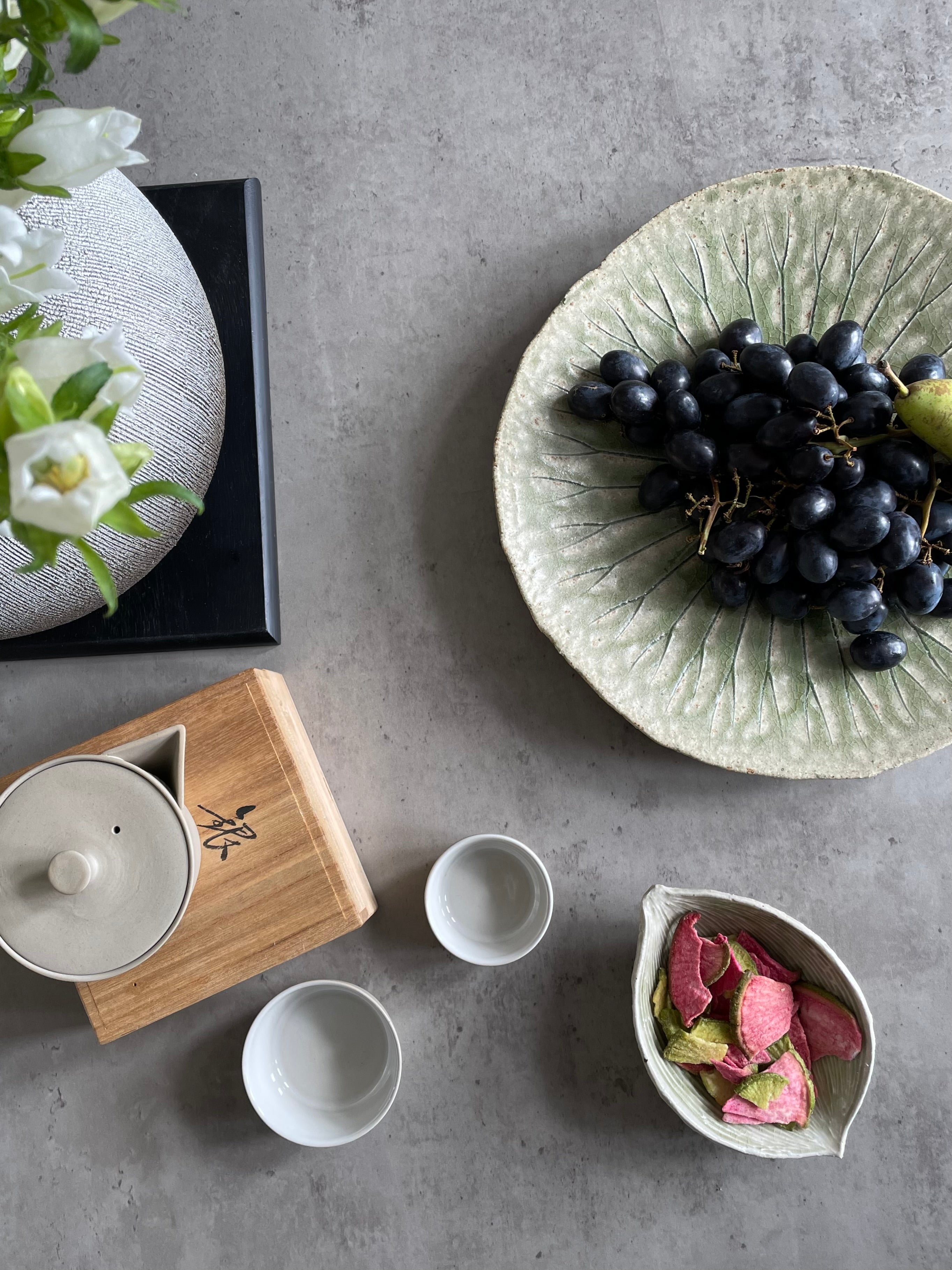 Tea set with low teapot and two cups/bowls