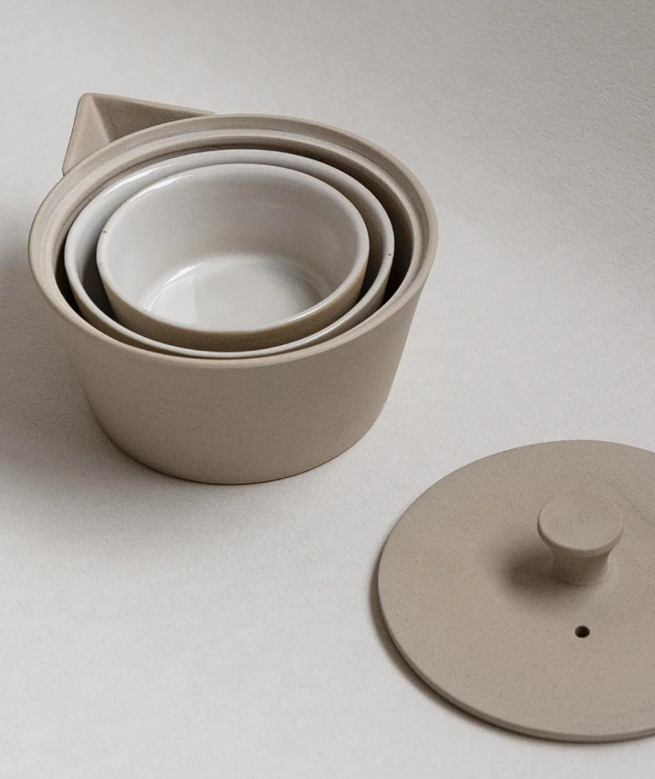 Tea set with low teapot and two cups/bowls