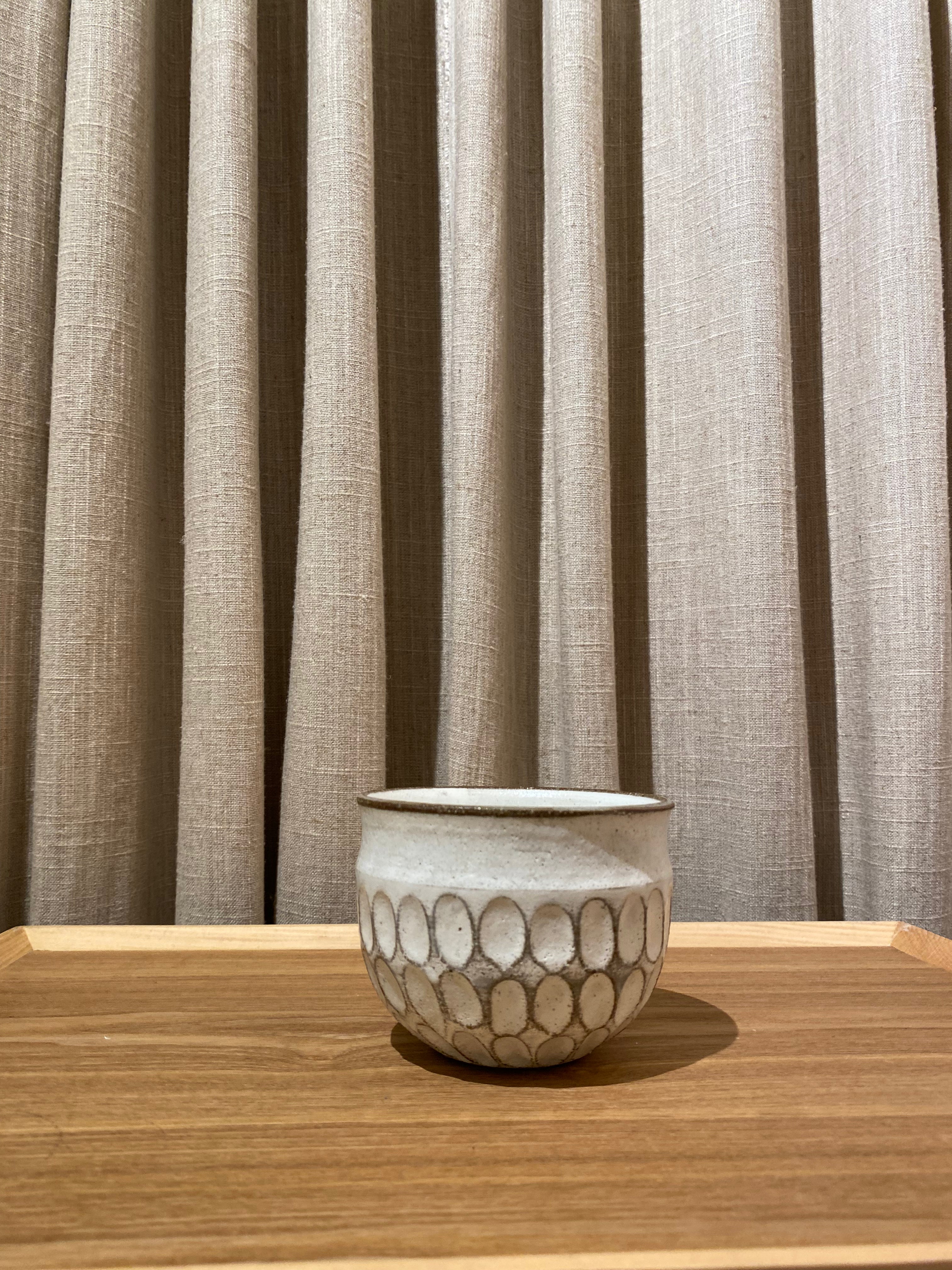 White cup with texture