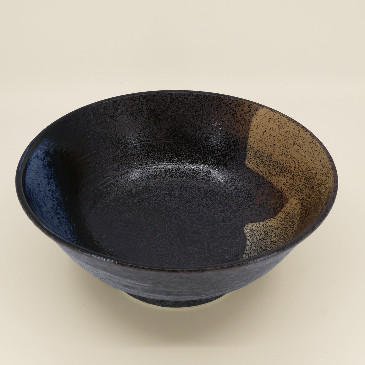 Ramen bowl with metallic glaze and blue/brown hues