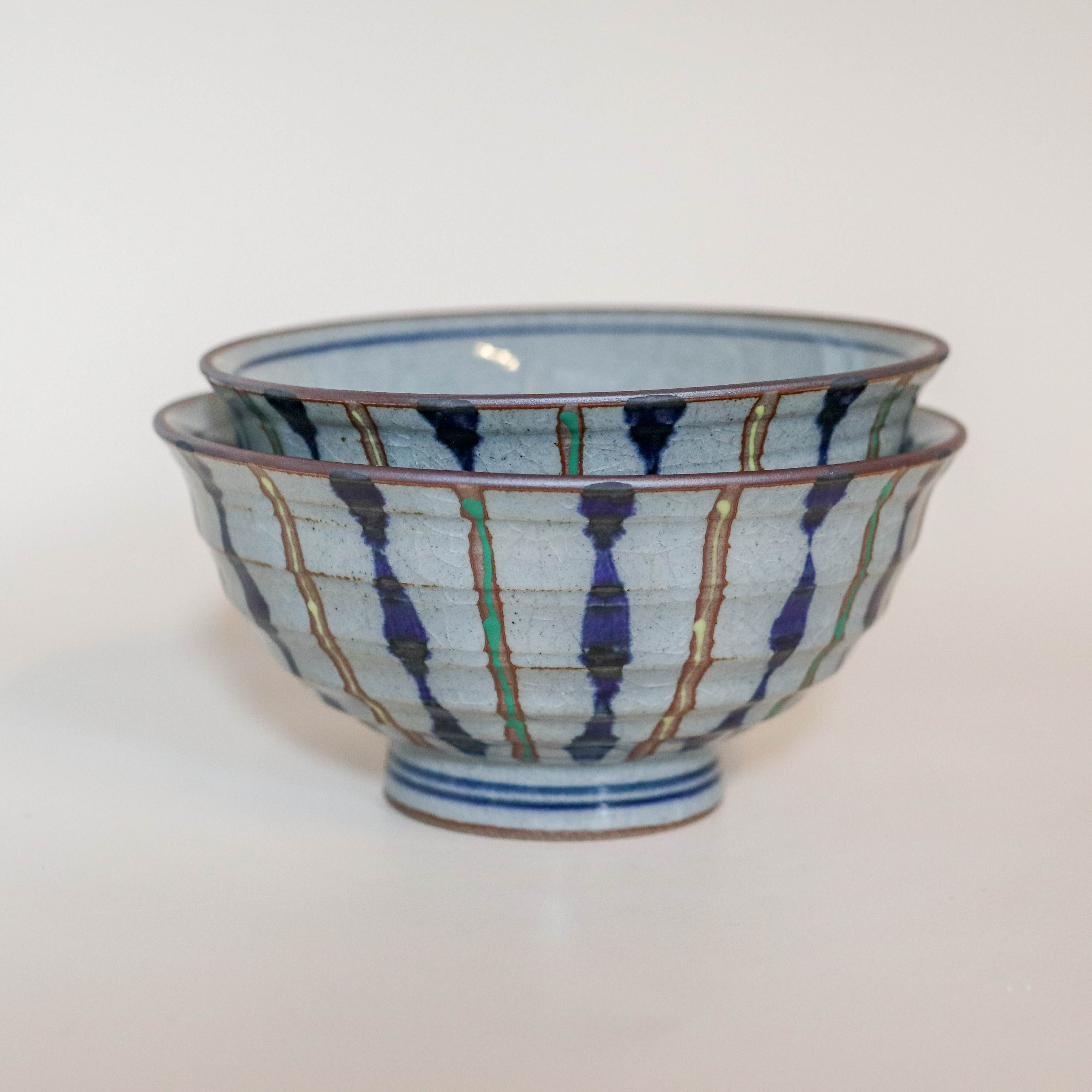 (Missing price, quantity) Gray bowl with blue, yellow and green stripes
