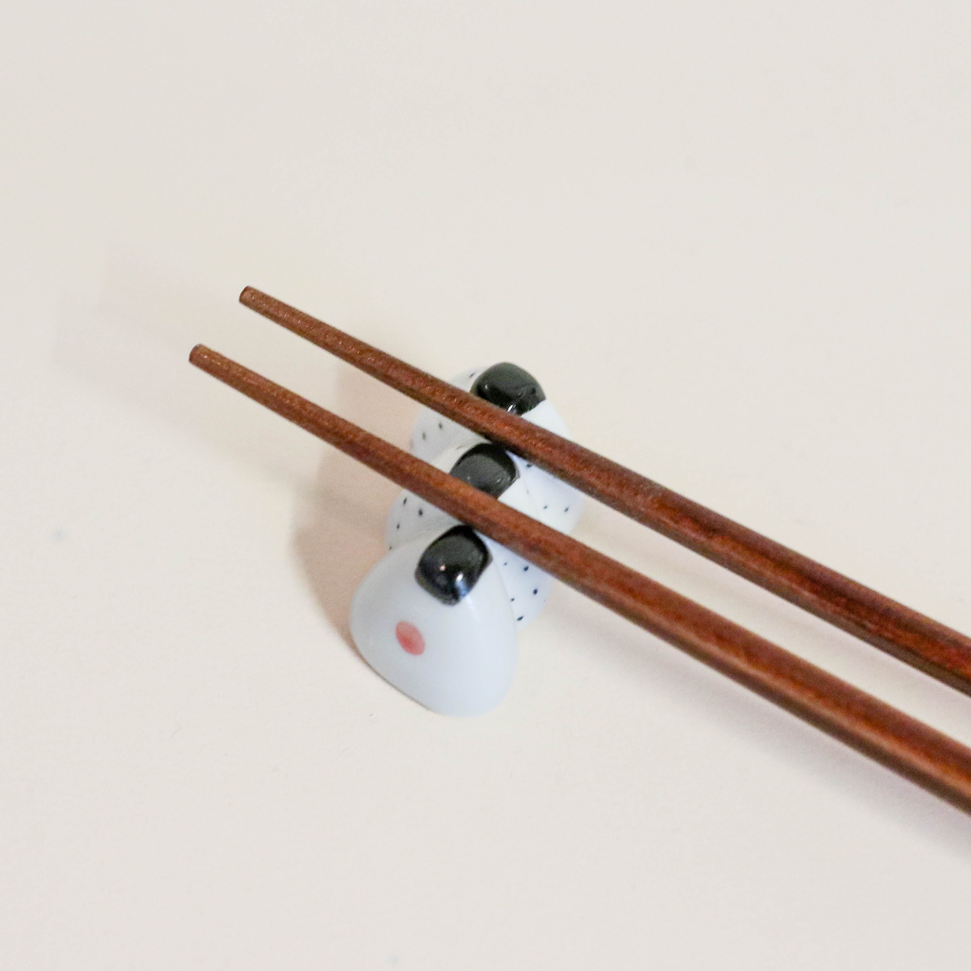 Spisepindeholder - 3 onigiri på række