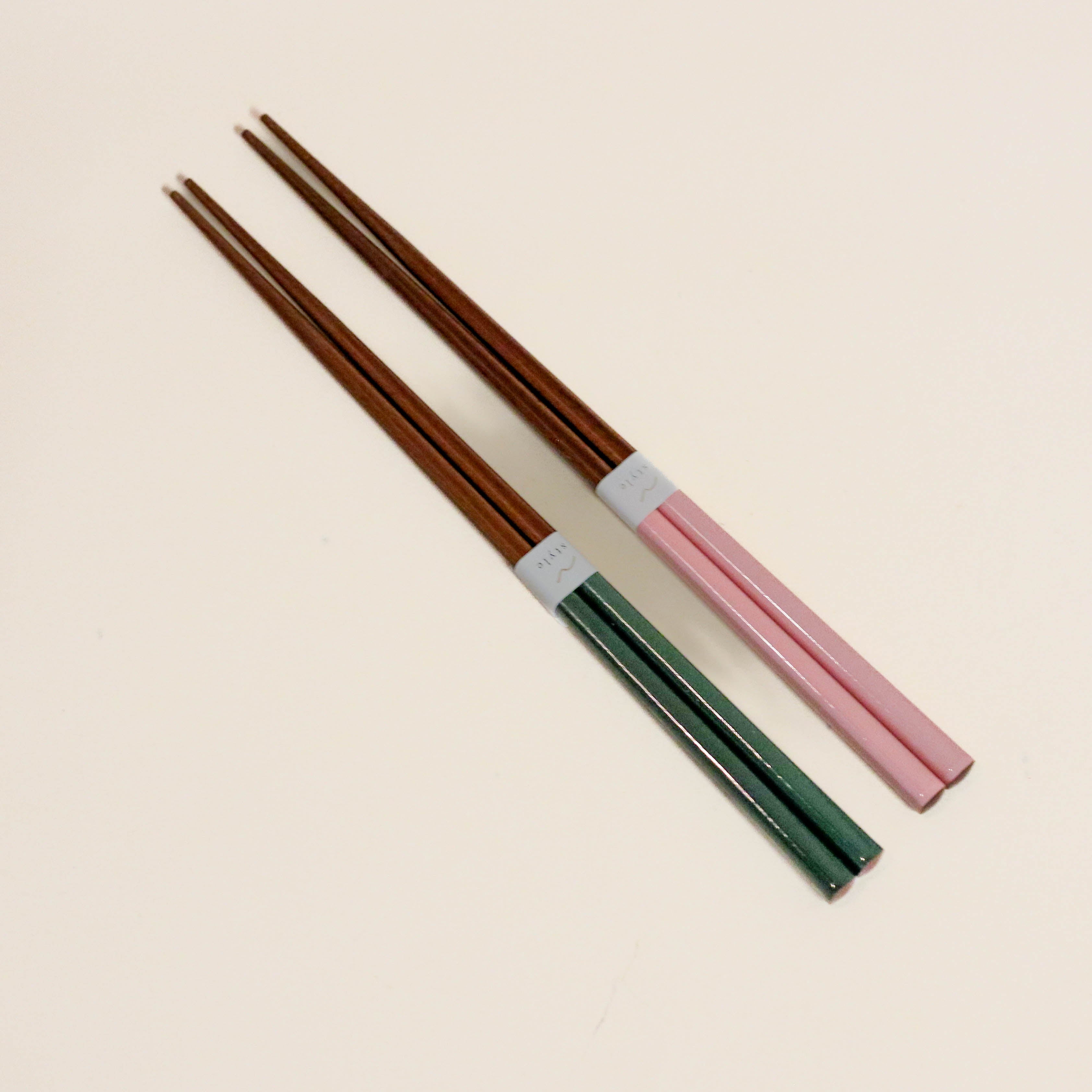 Chopsticks in dark wood with colored lacquer