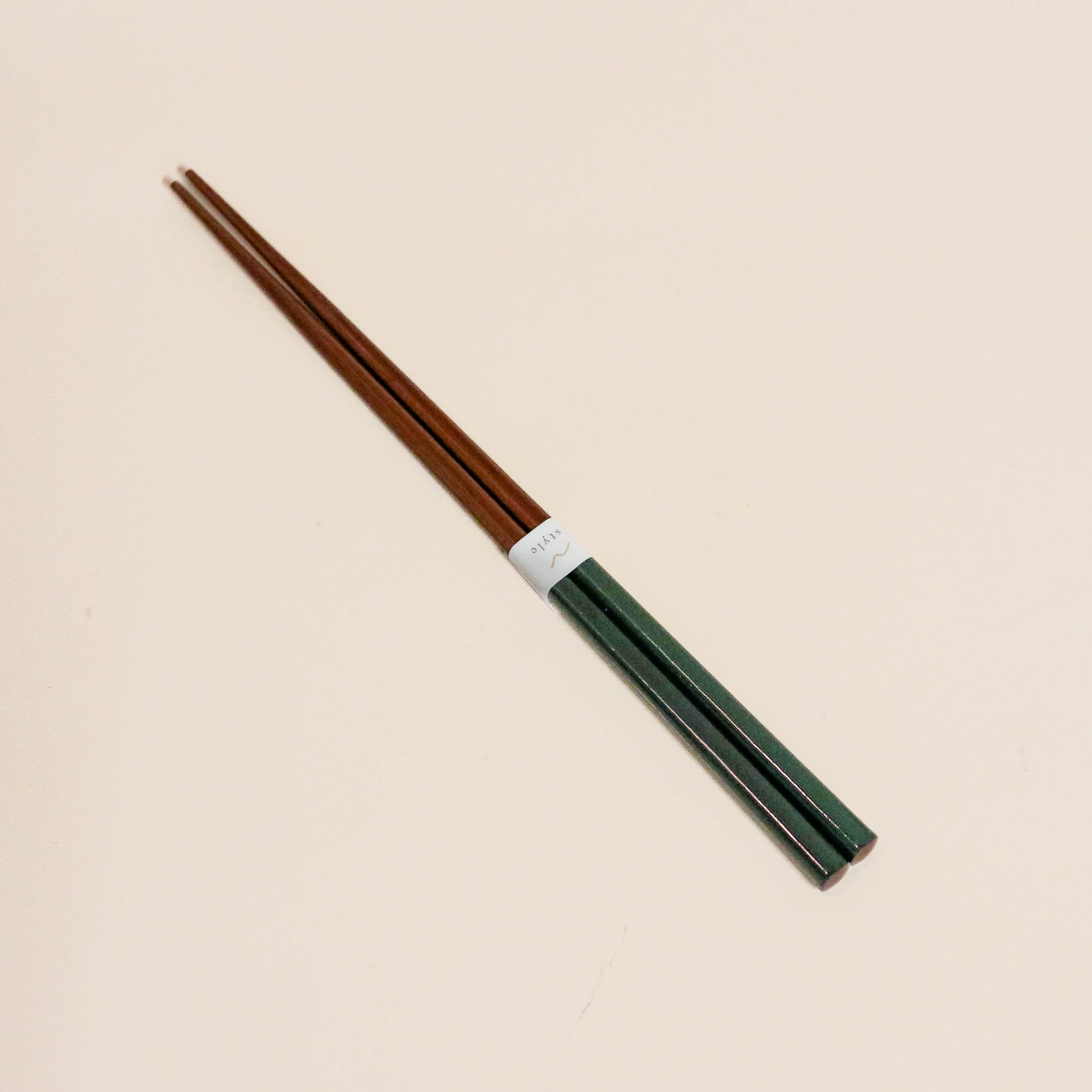 Chopsticks in dark wood with colored lacquer