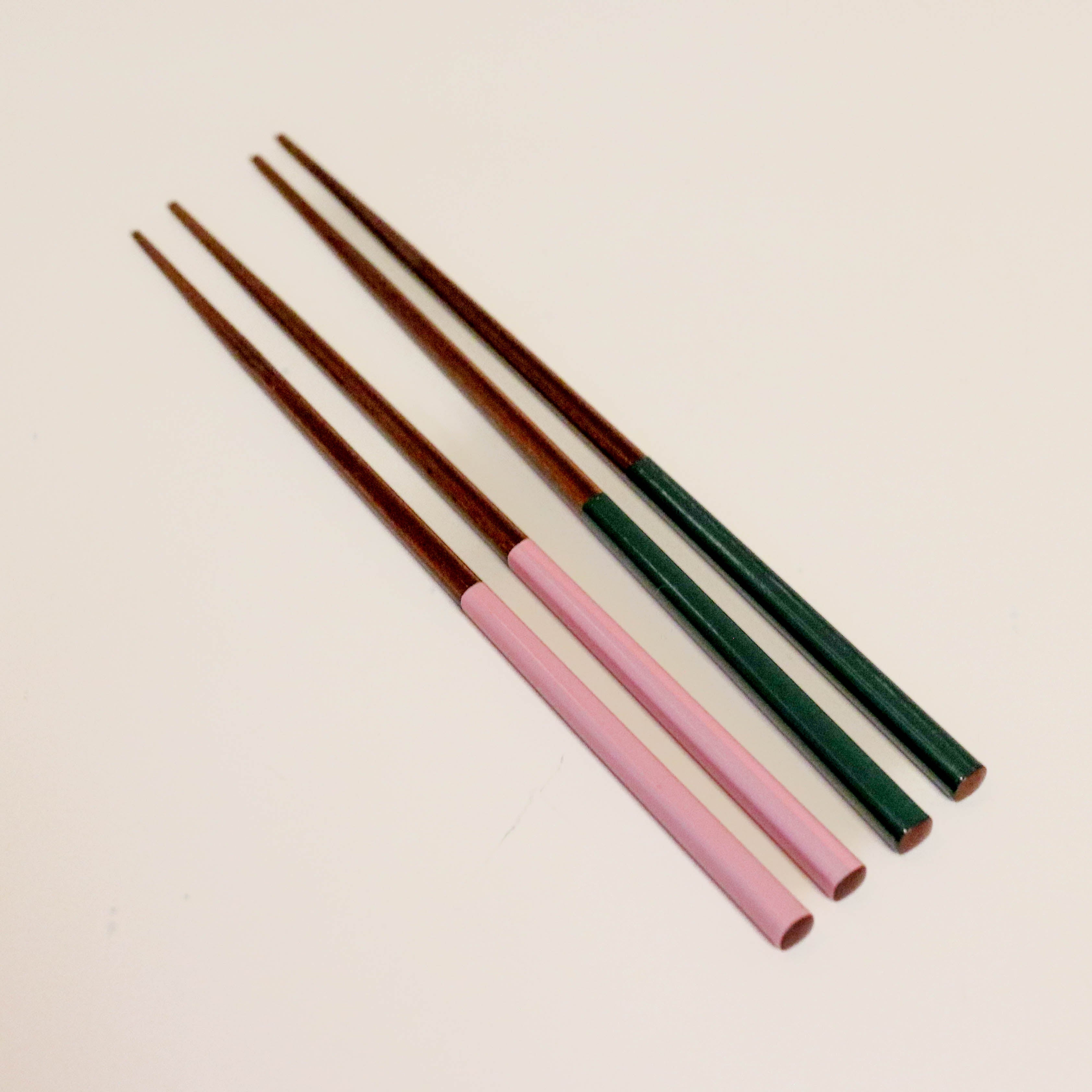 Chopsticks in dark wood with colored lacquer