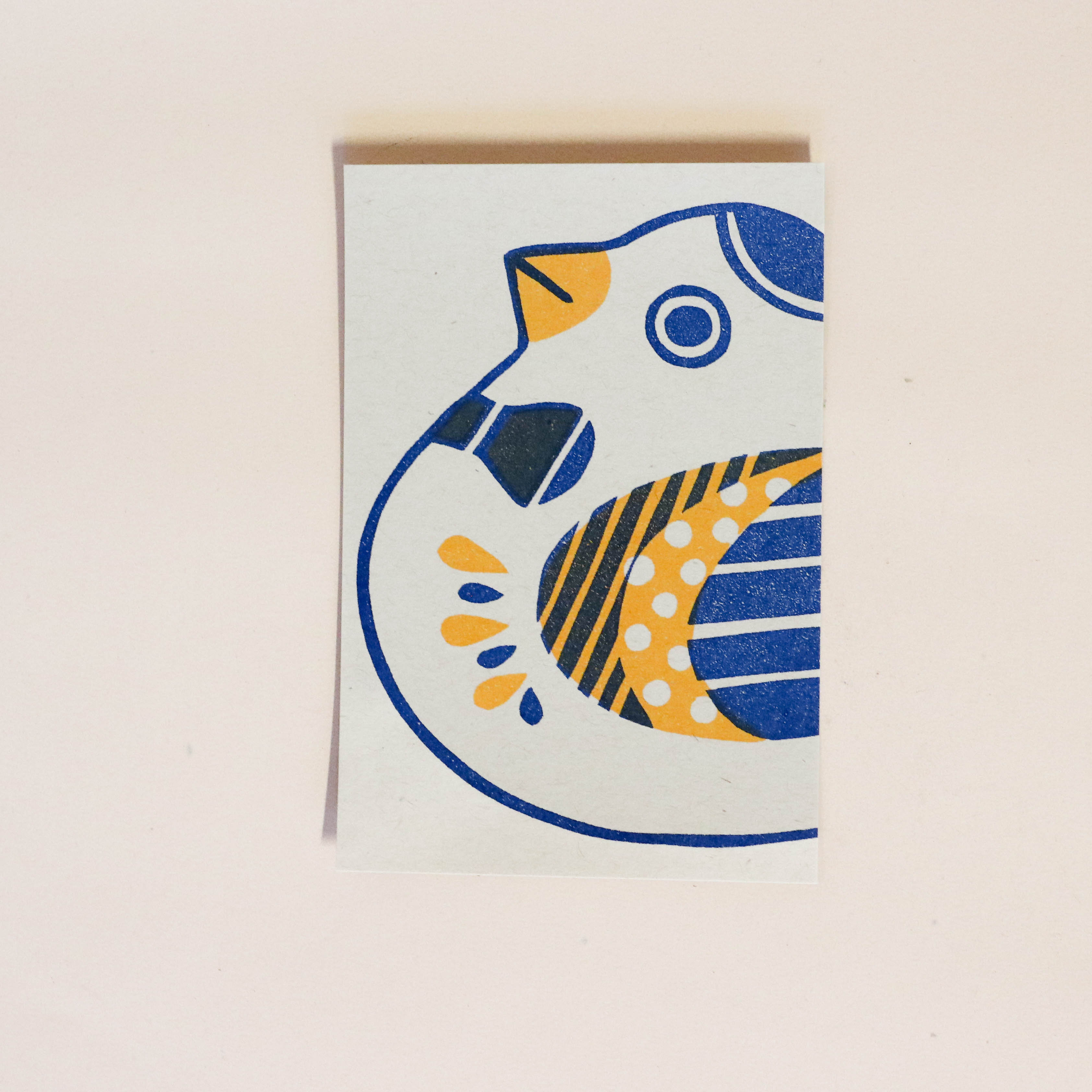 Postcard with blue and yellow bird