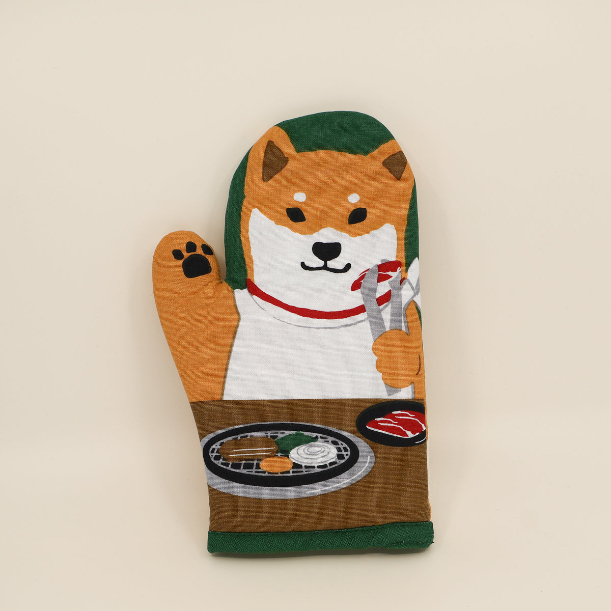 Grillhandske med shiba der griller