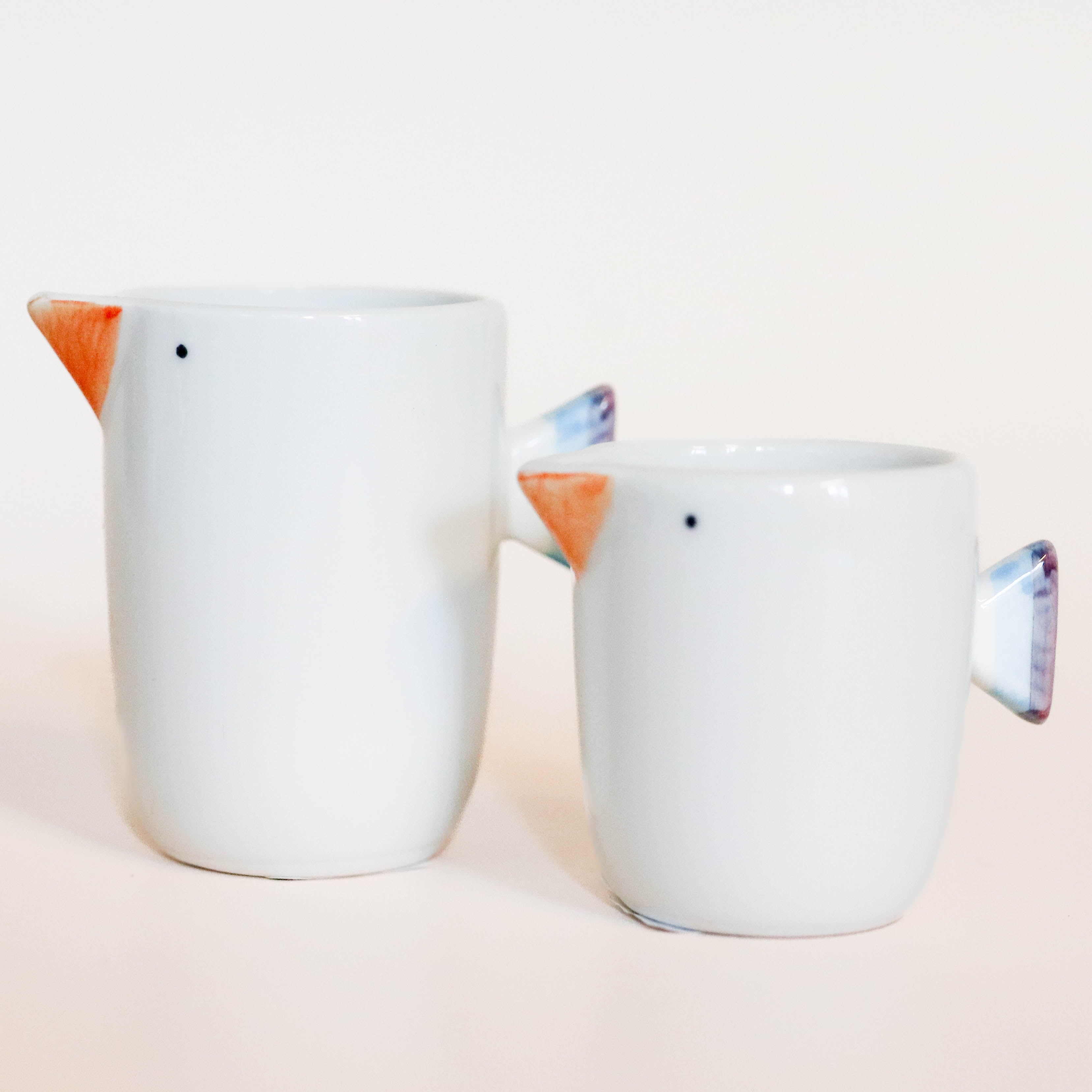 (Missing price and quantity) Milk jug with bird motif