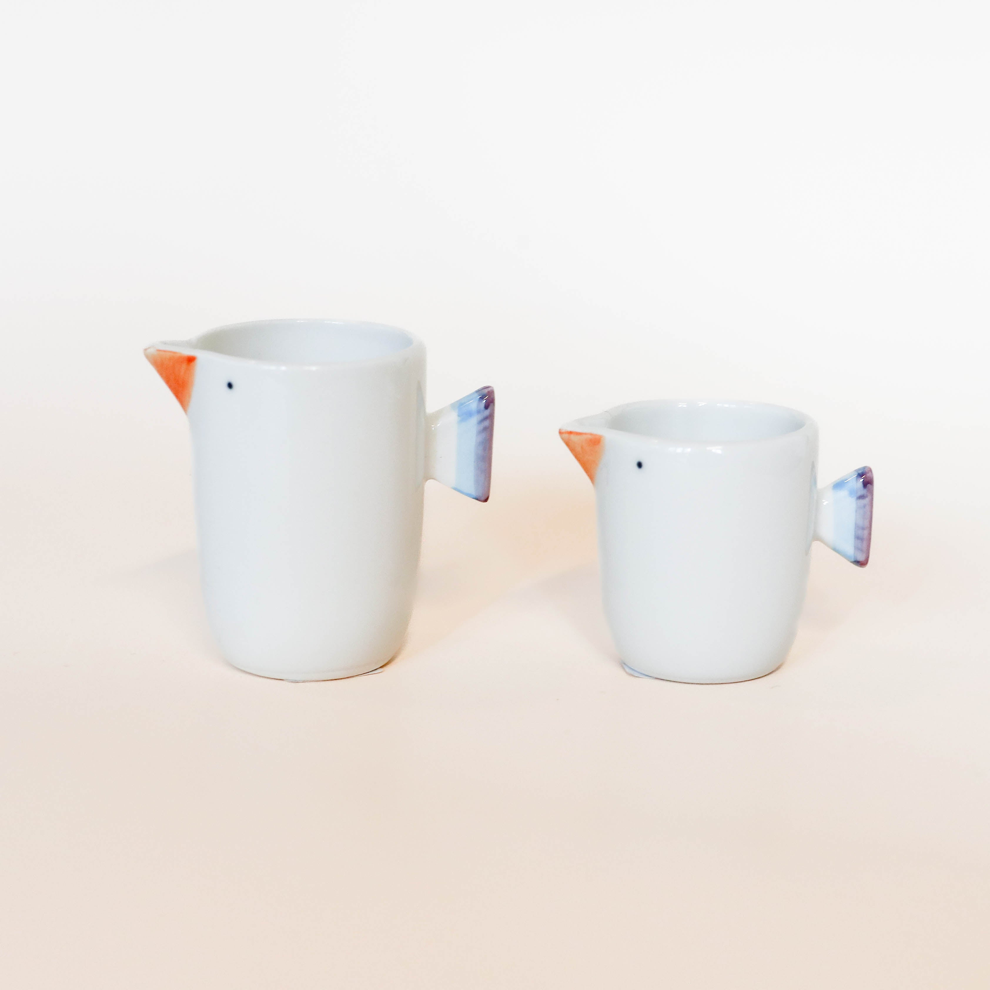 (Missing price and quantity) Milk jug with bird motif