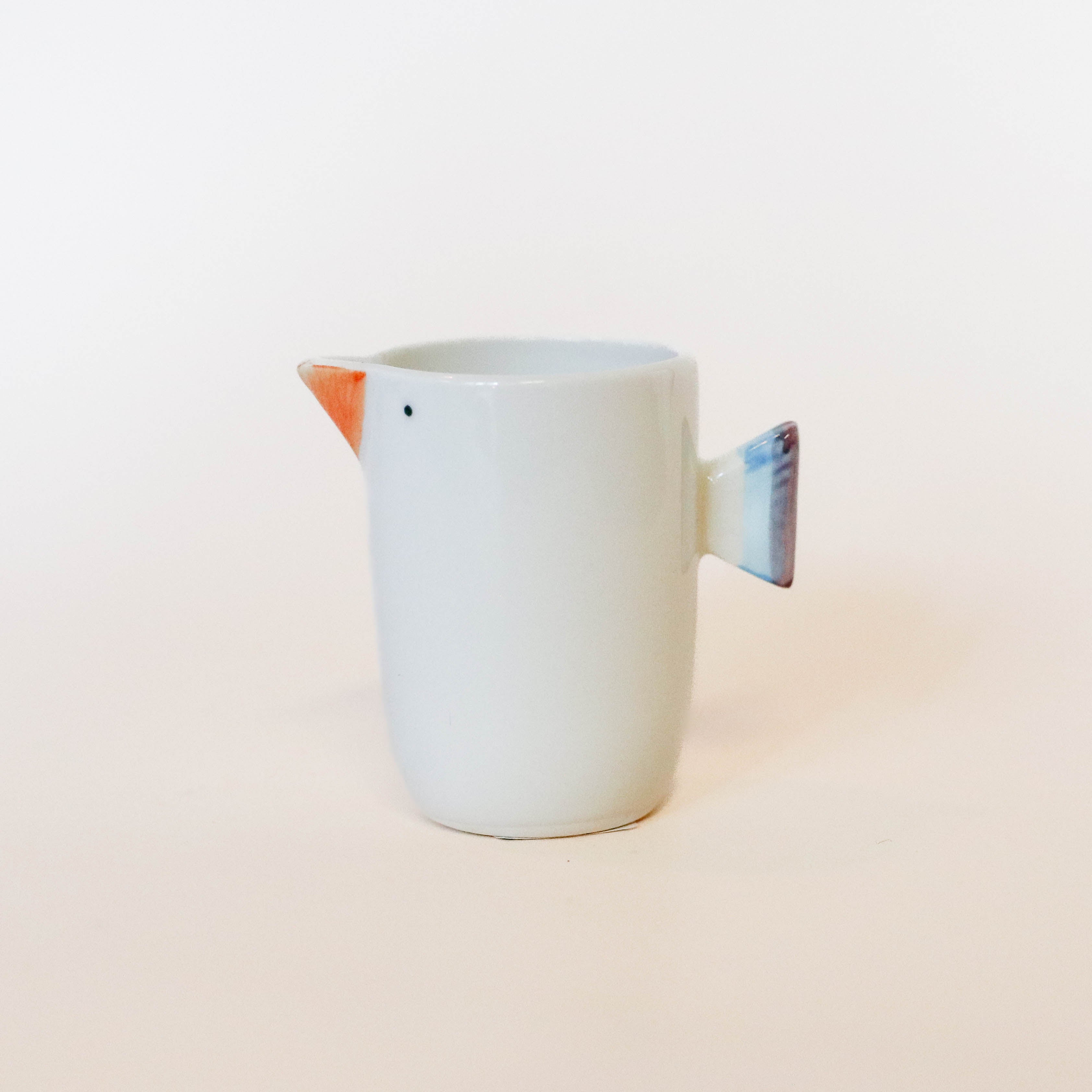 (Missing price and quantity) Milk jug with bird motif