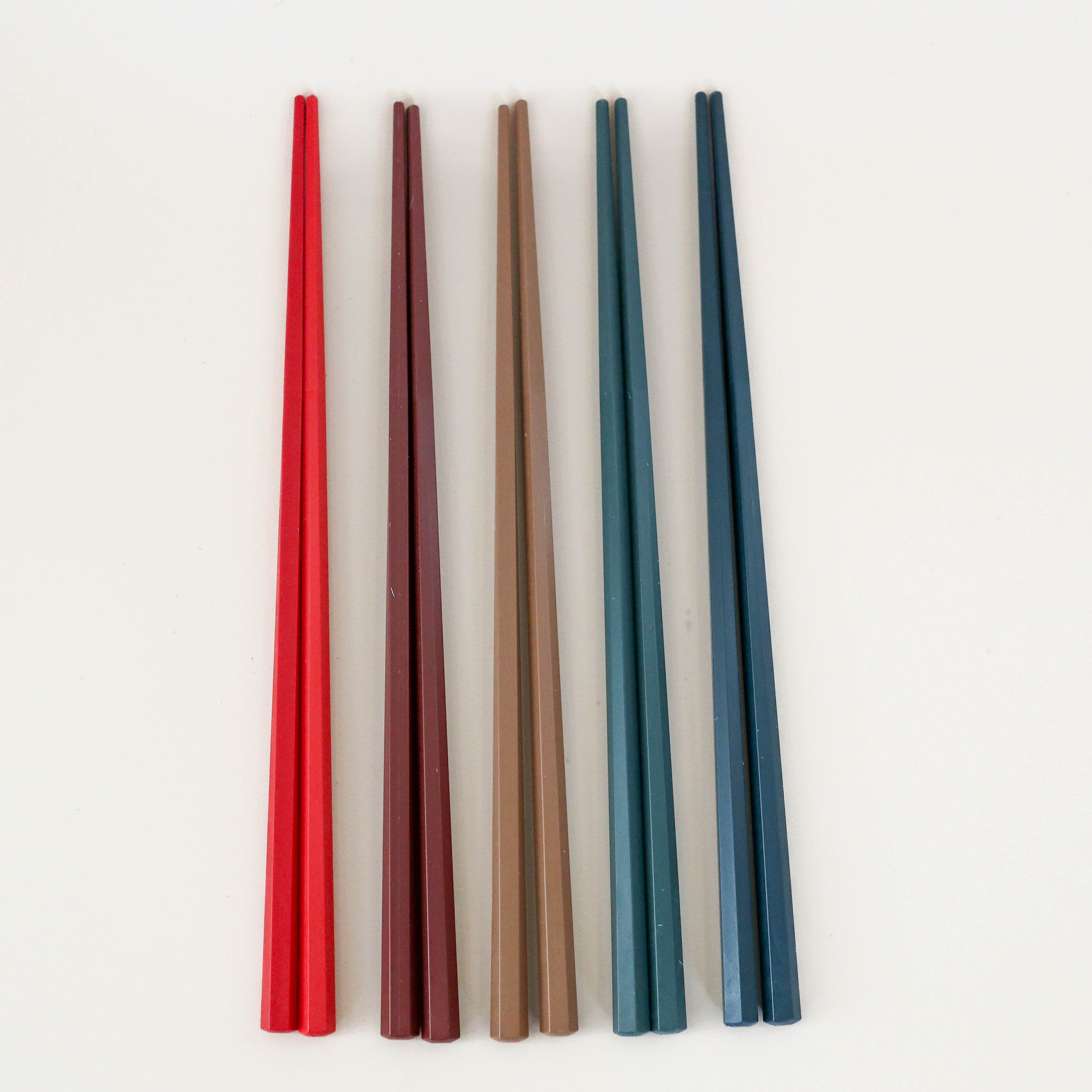 Chopsticks in red, brown and blue colors