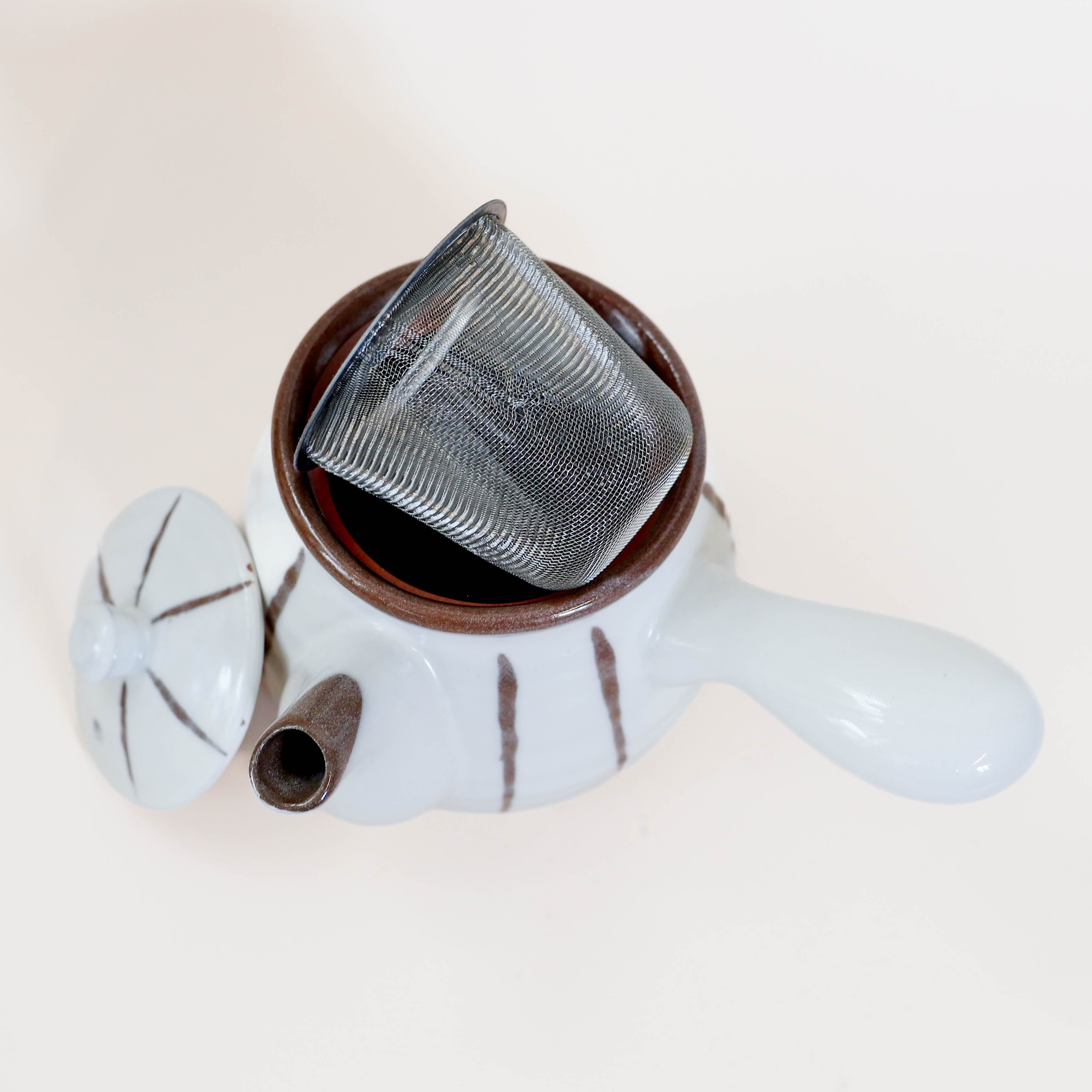 (Missing price and quantity) White teapot with brown details and handle