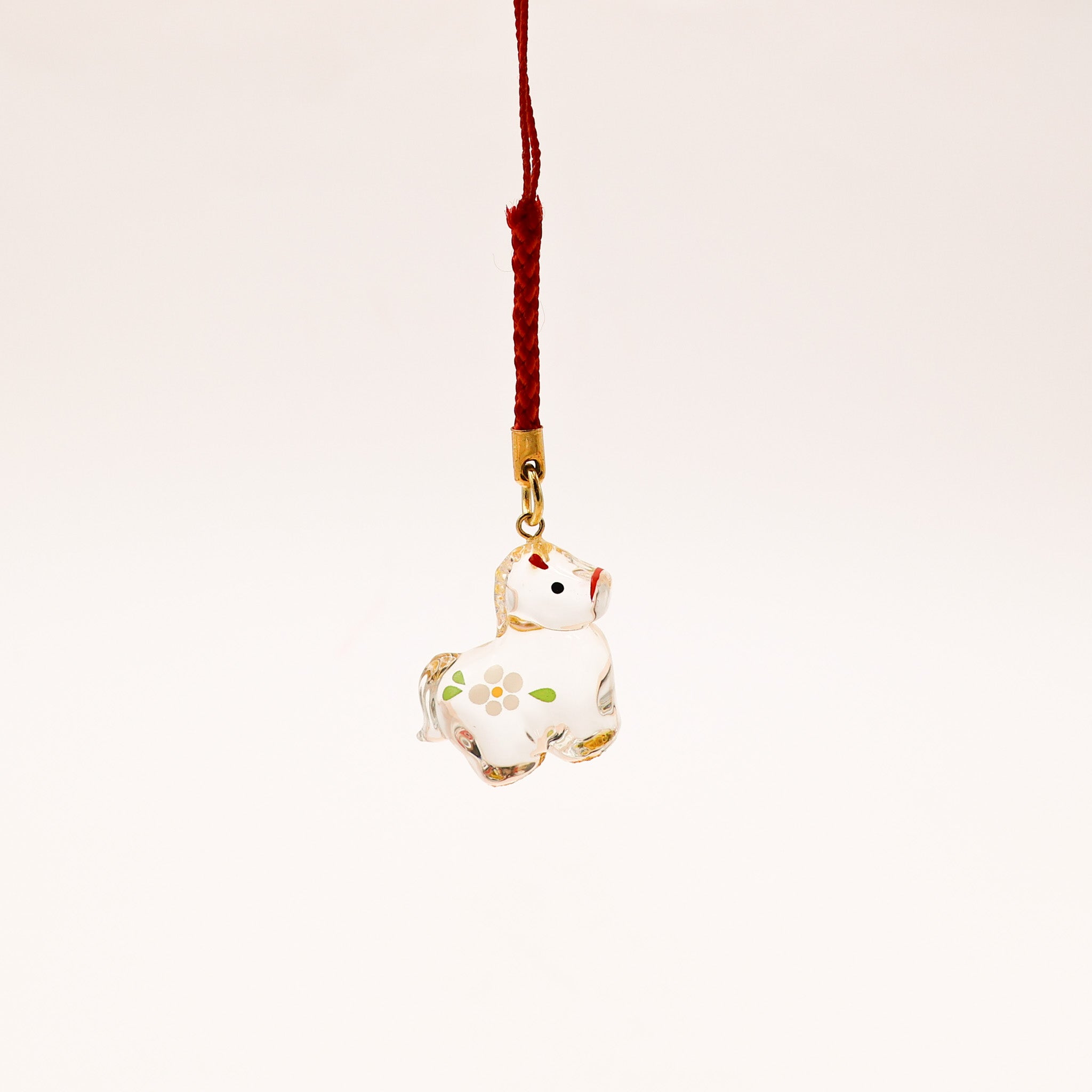 Heste ornament i glas med guld detaljer