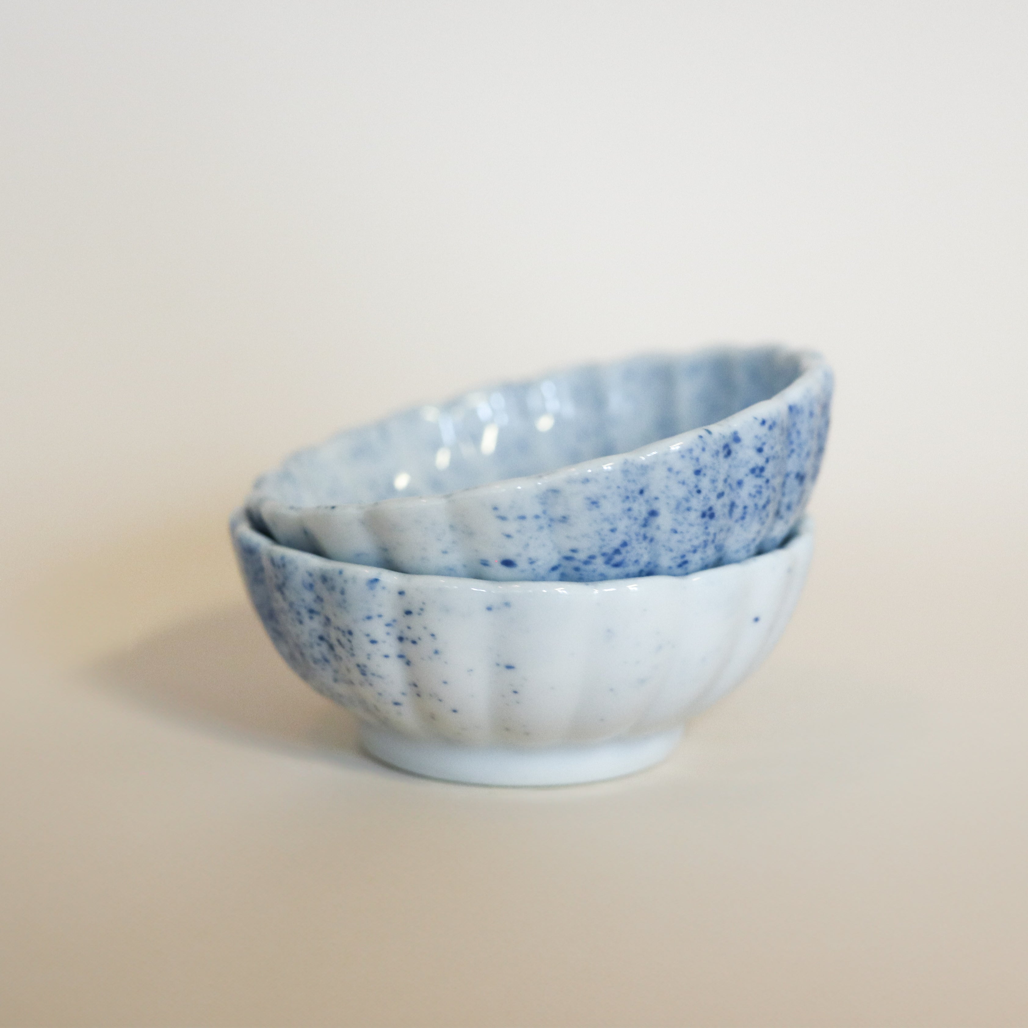 Lille blomsterskål med blå splash