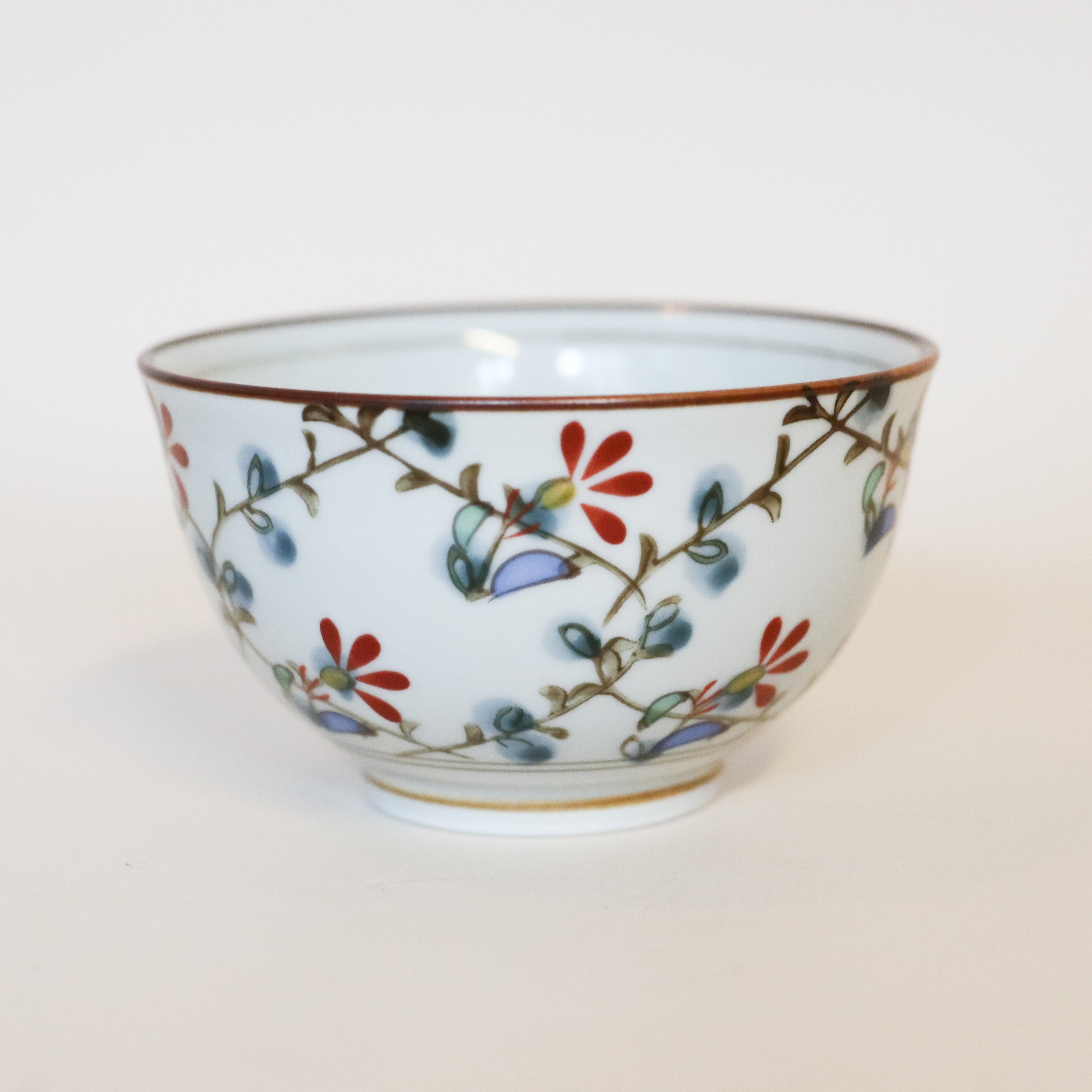 Skål/tekop med blå og røde blomster