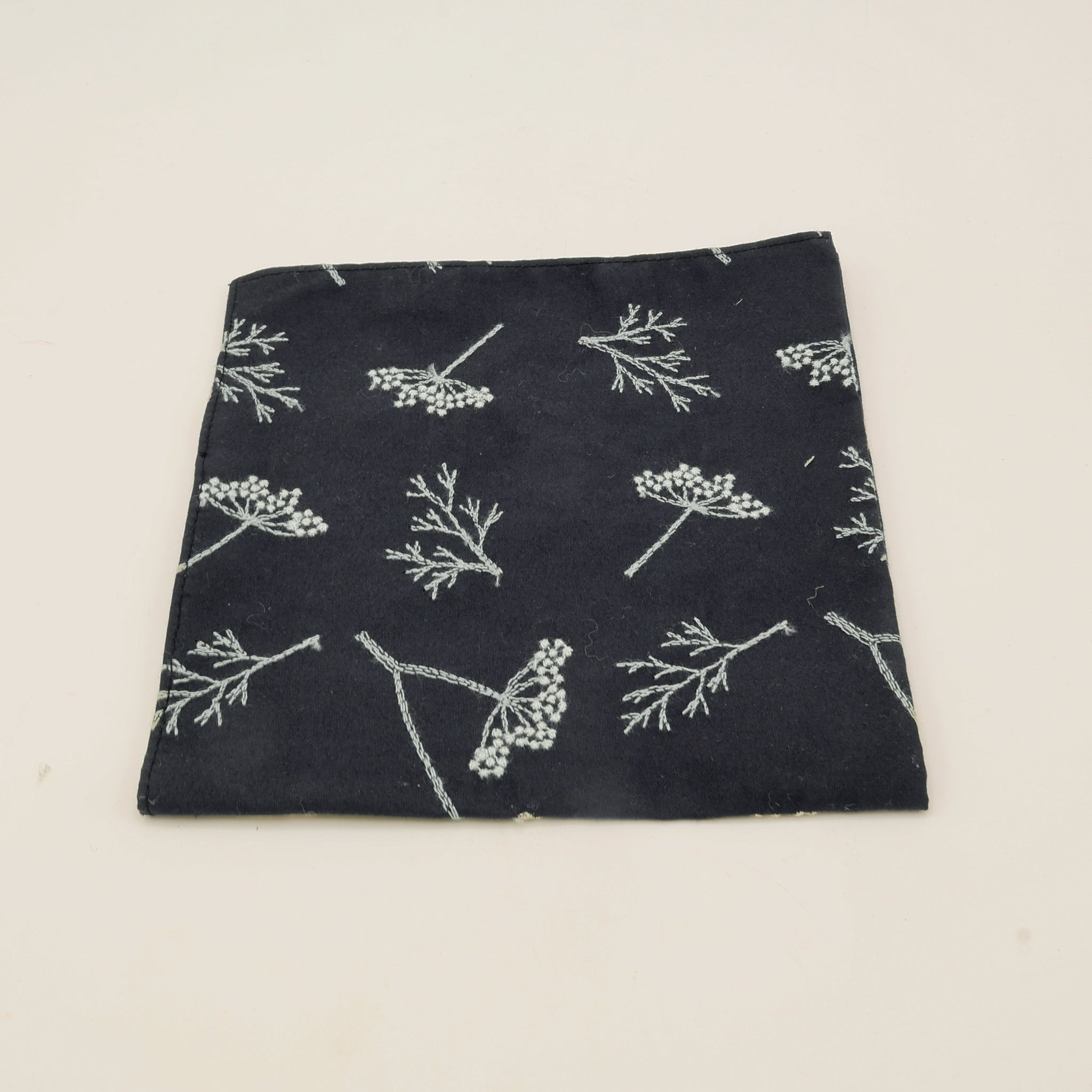 Cloth napkins with embroidered flowers