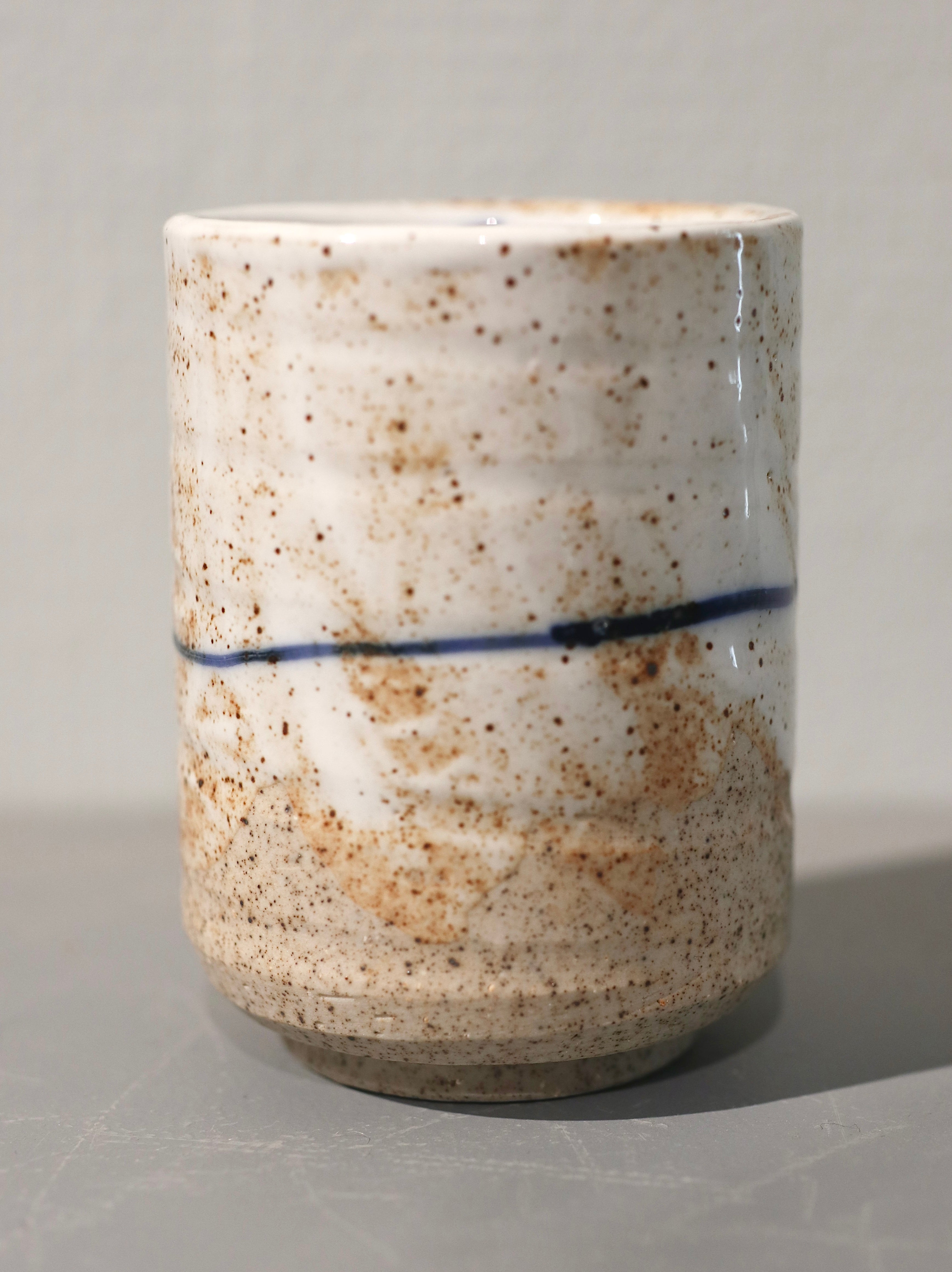 Smal kop med blå stribe