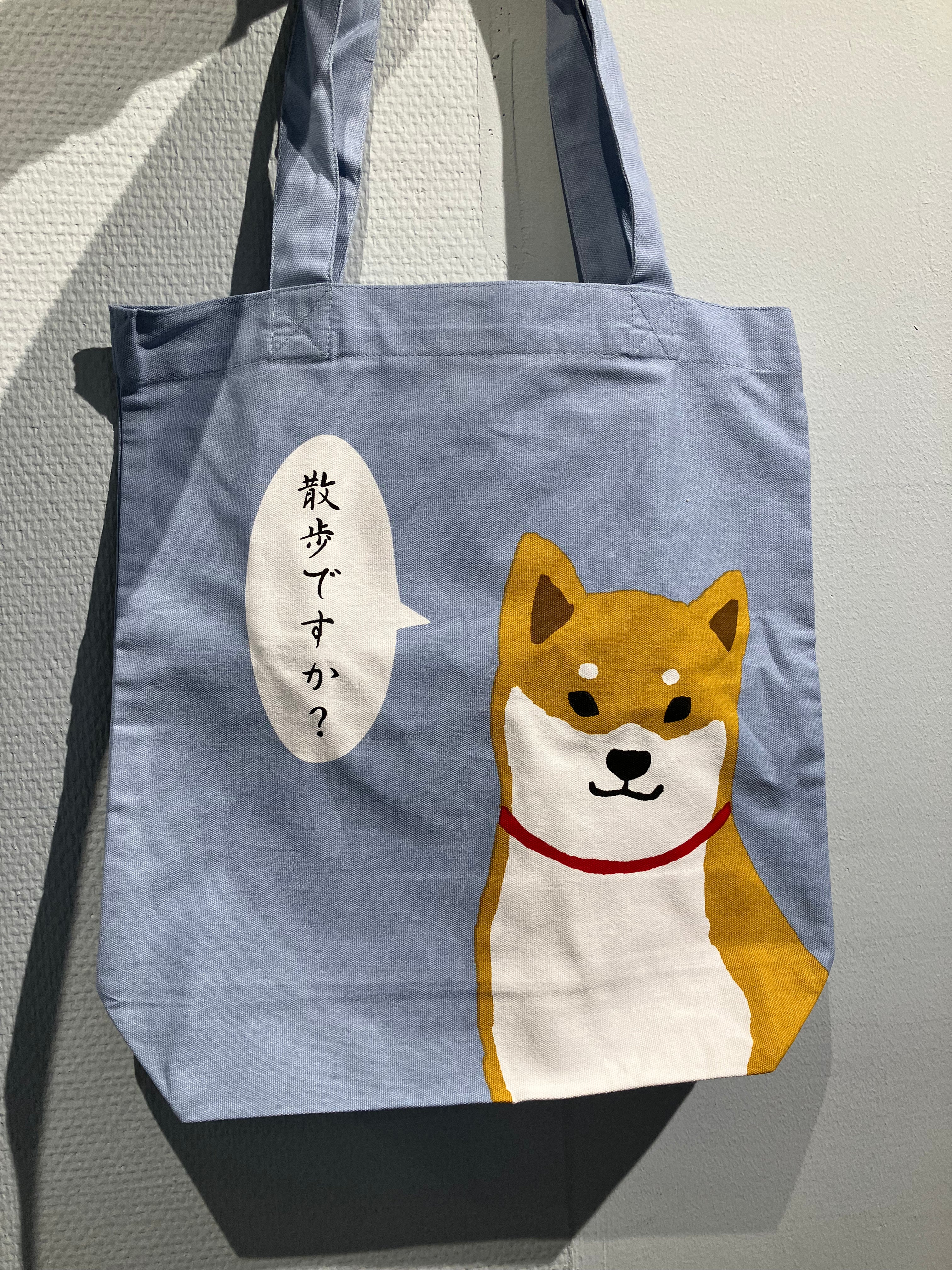 Lyseblå tote bag: Shiba med taleboble