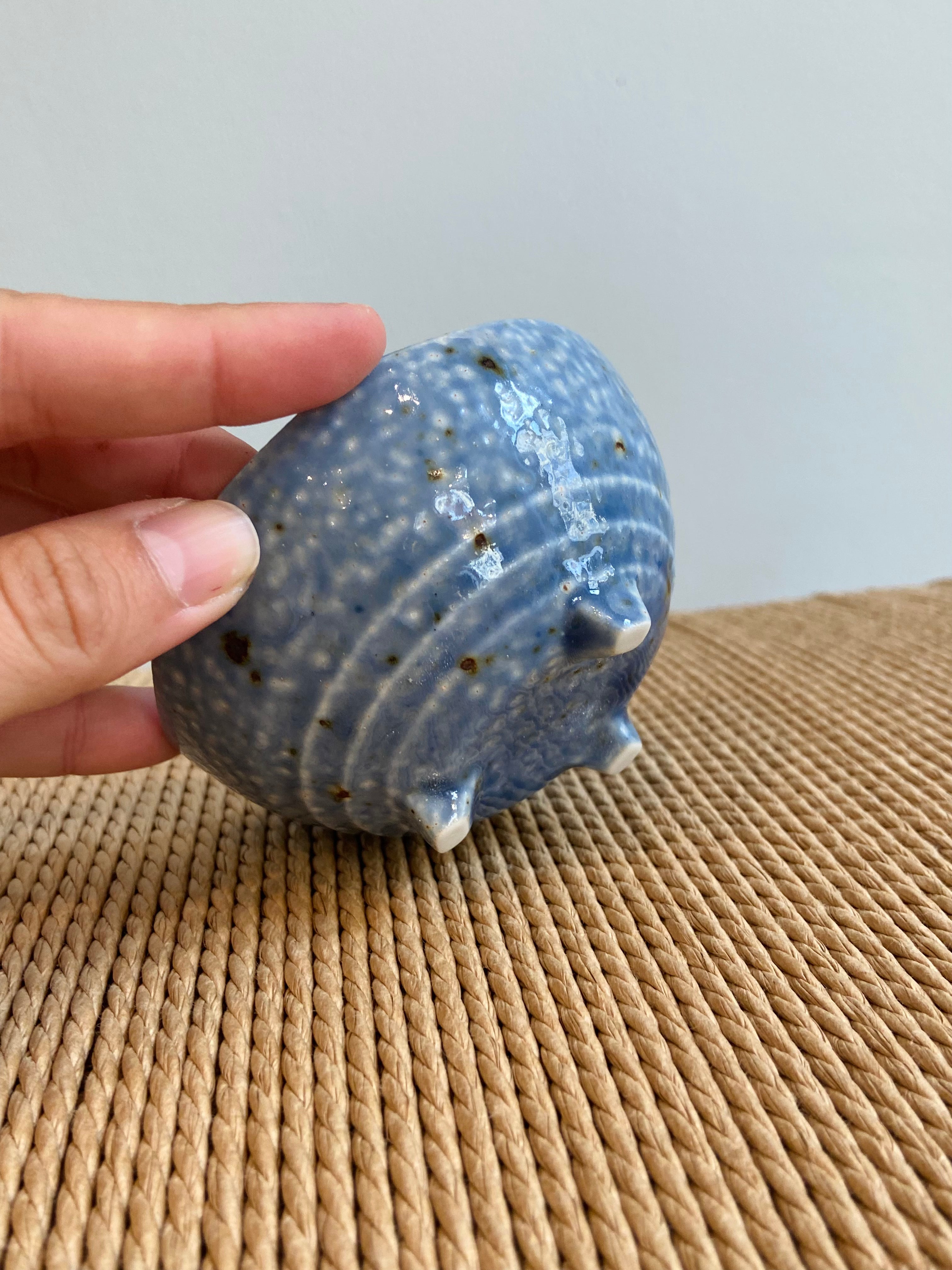 Light blue bowl with three feet