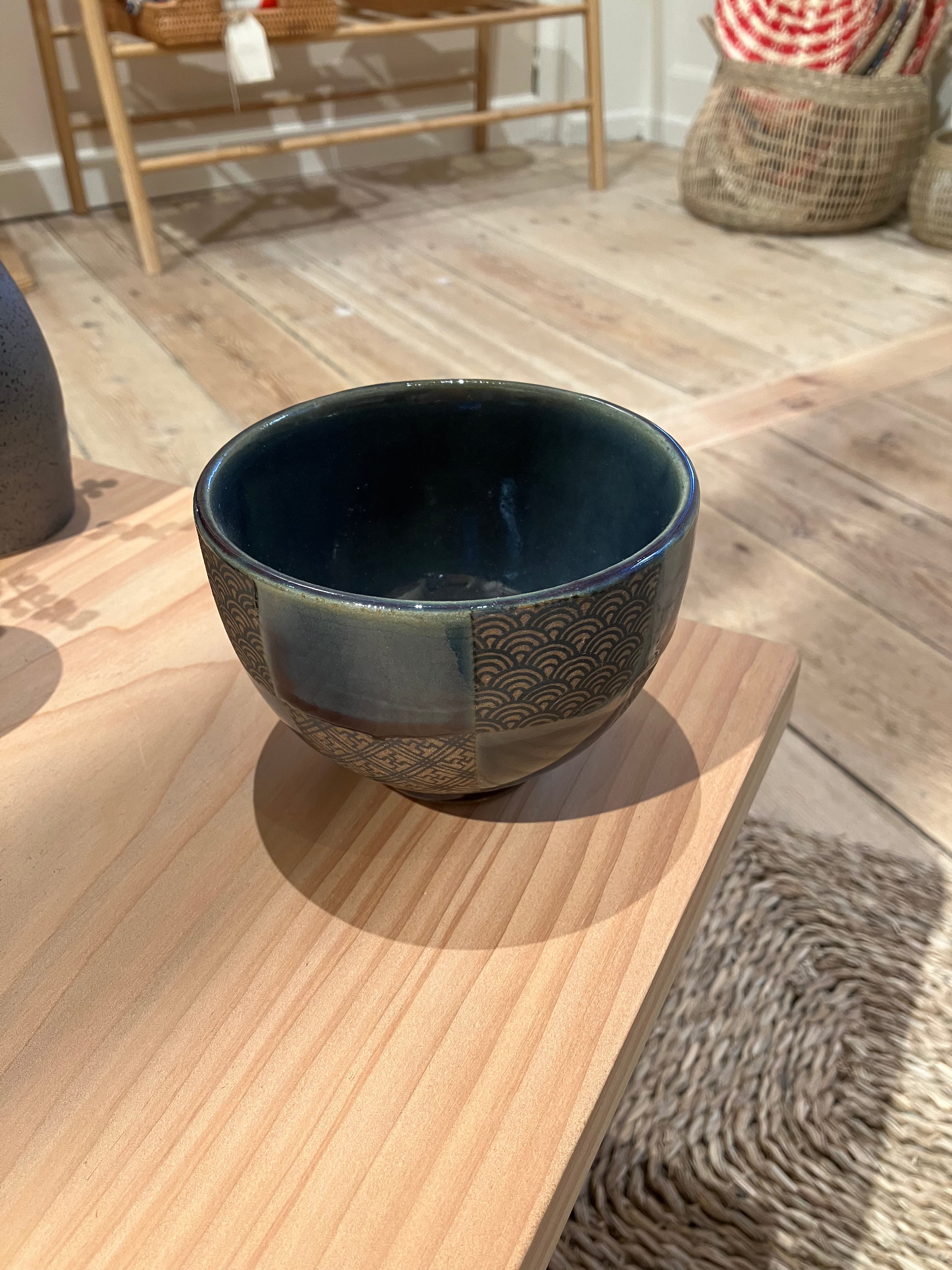 Ceramic bowl with blue checks and Japanese patterns