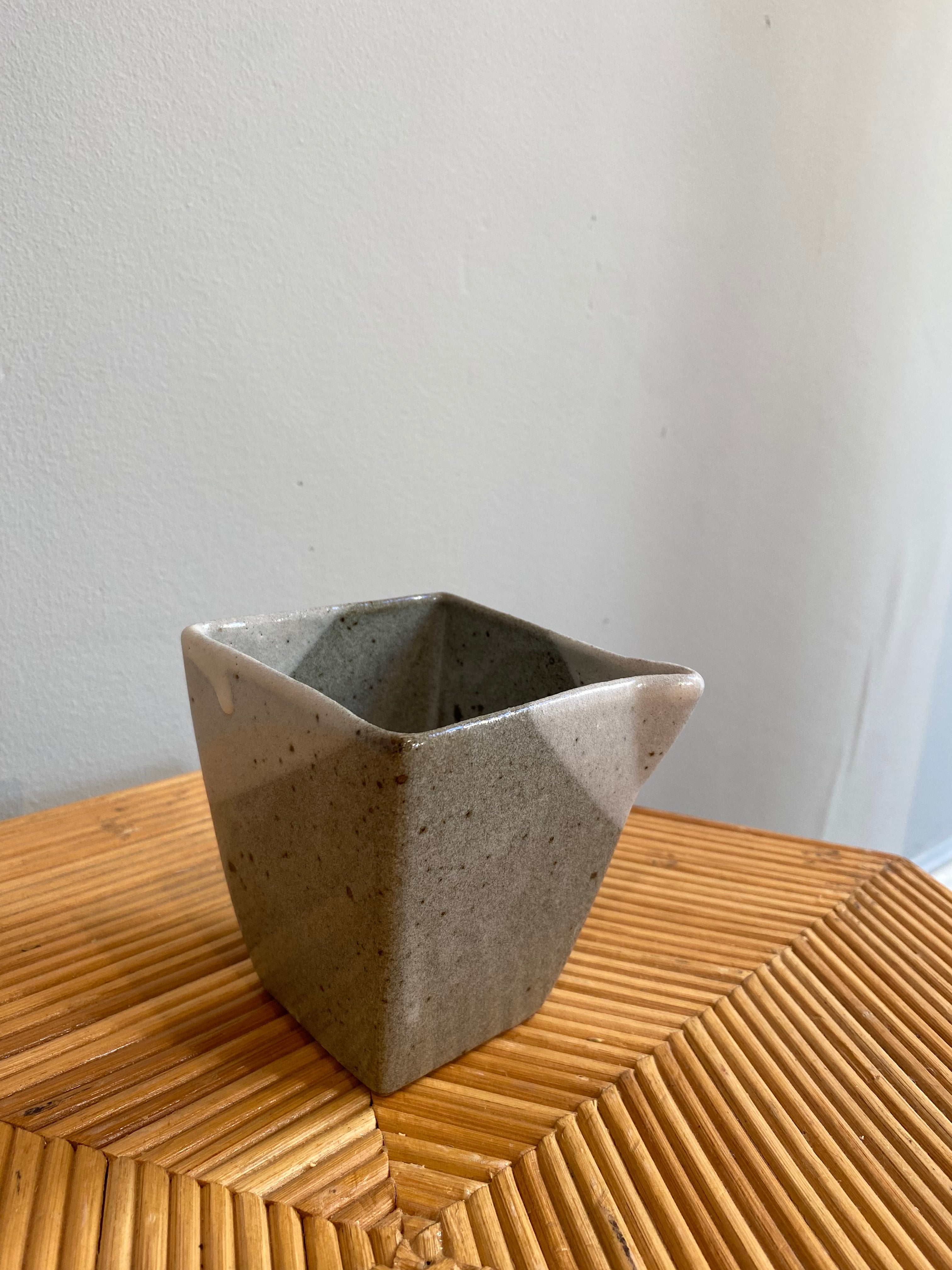 Square sake pitcher with gray glaze and crackers