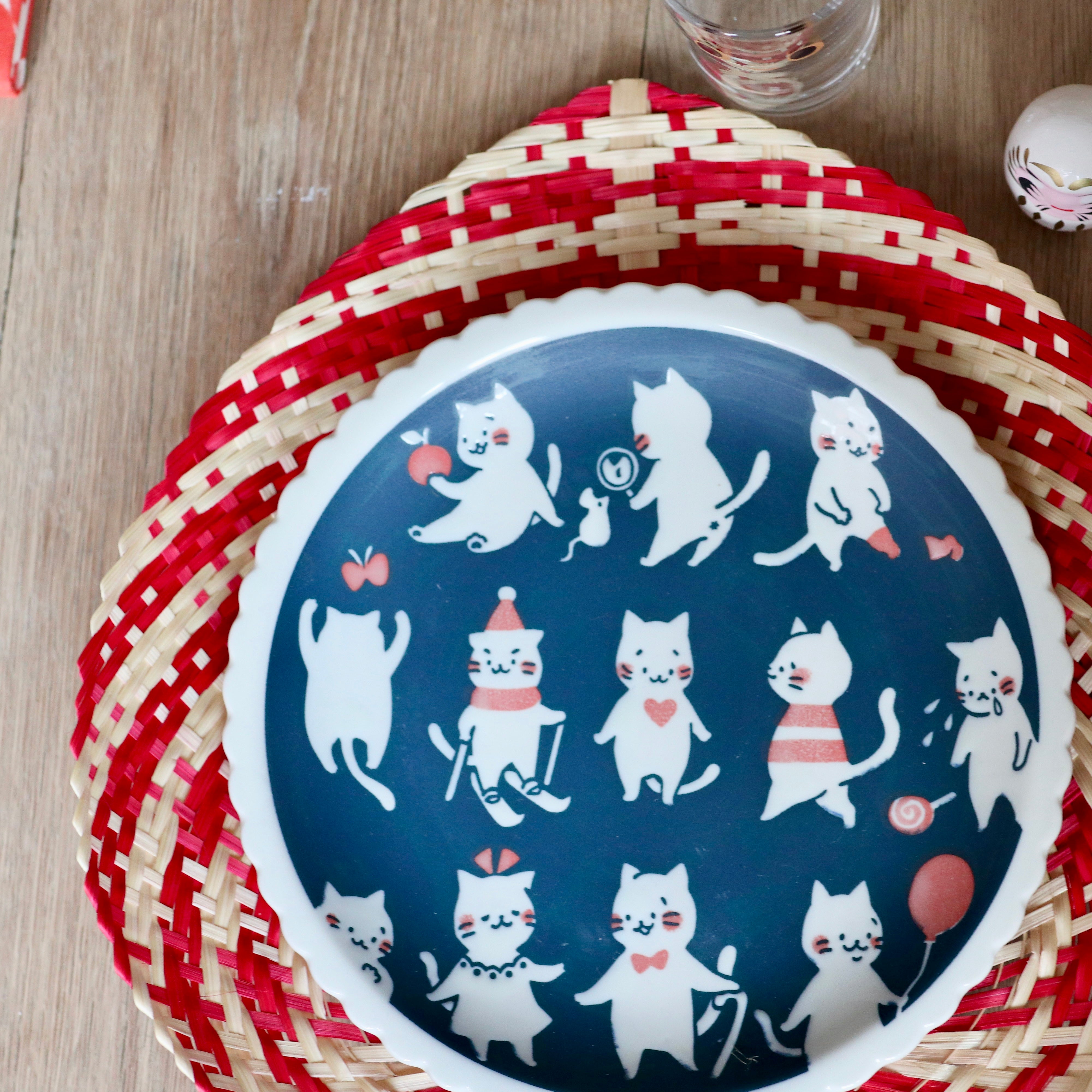 Japanese plate with different cats