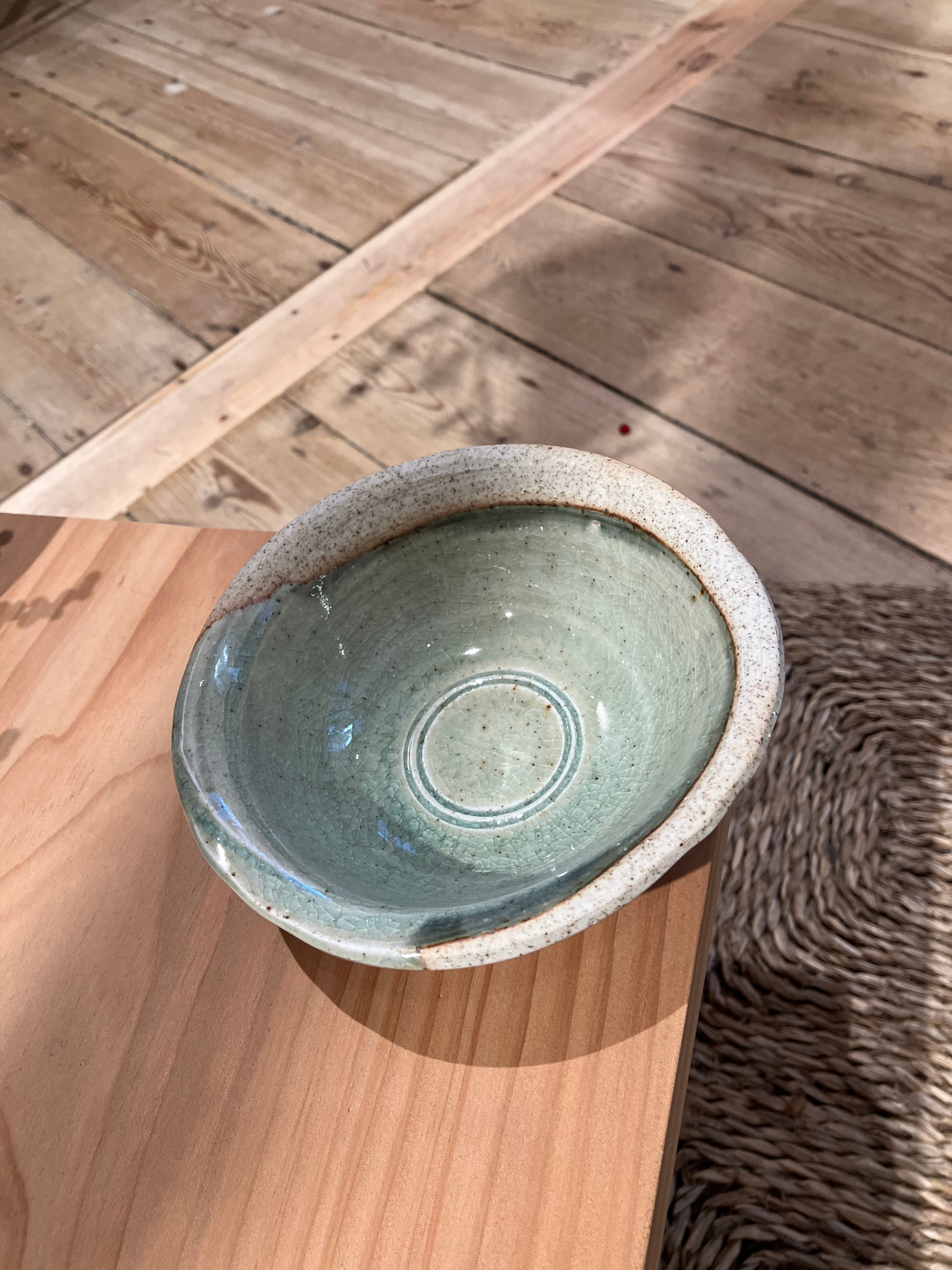 Stoneware bowl with green glaze