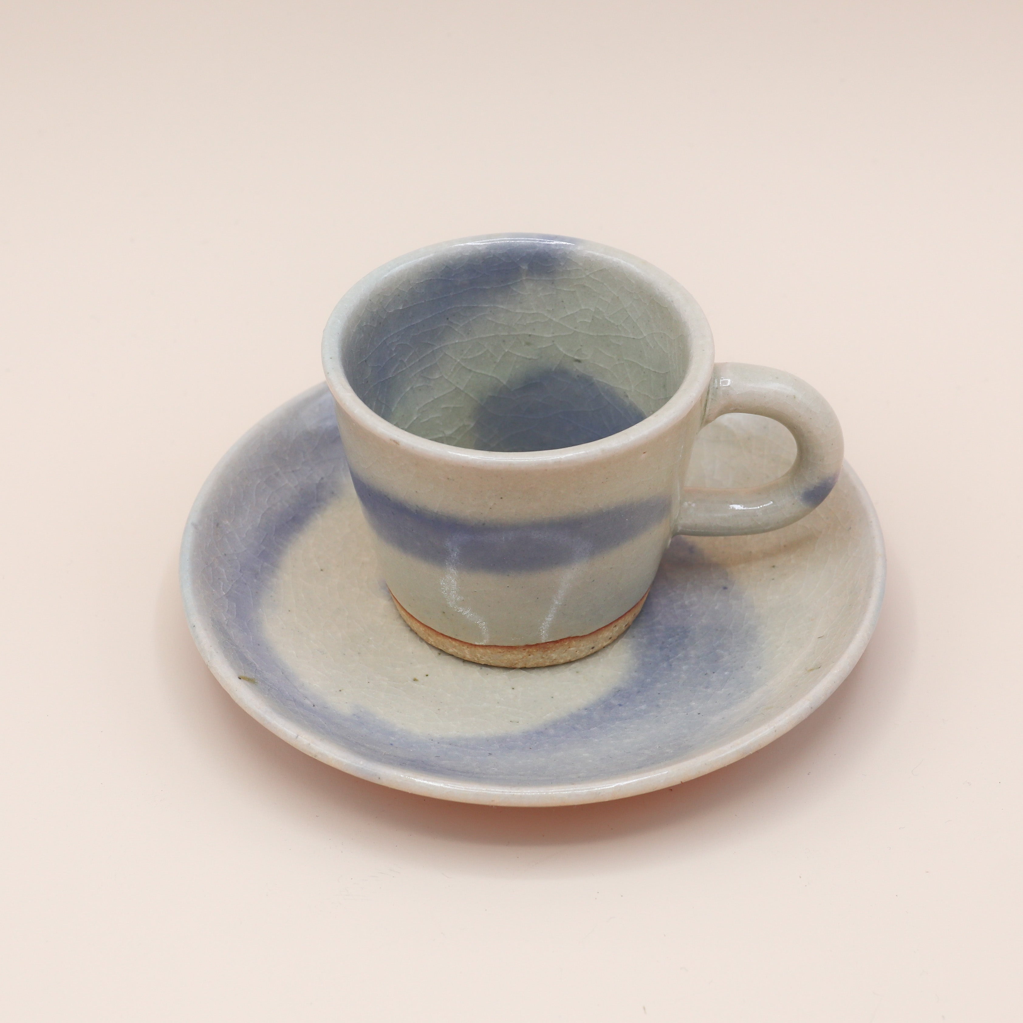 Kop med underkop i blå nuancer