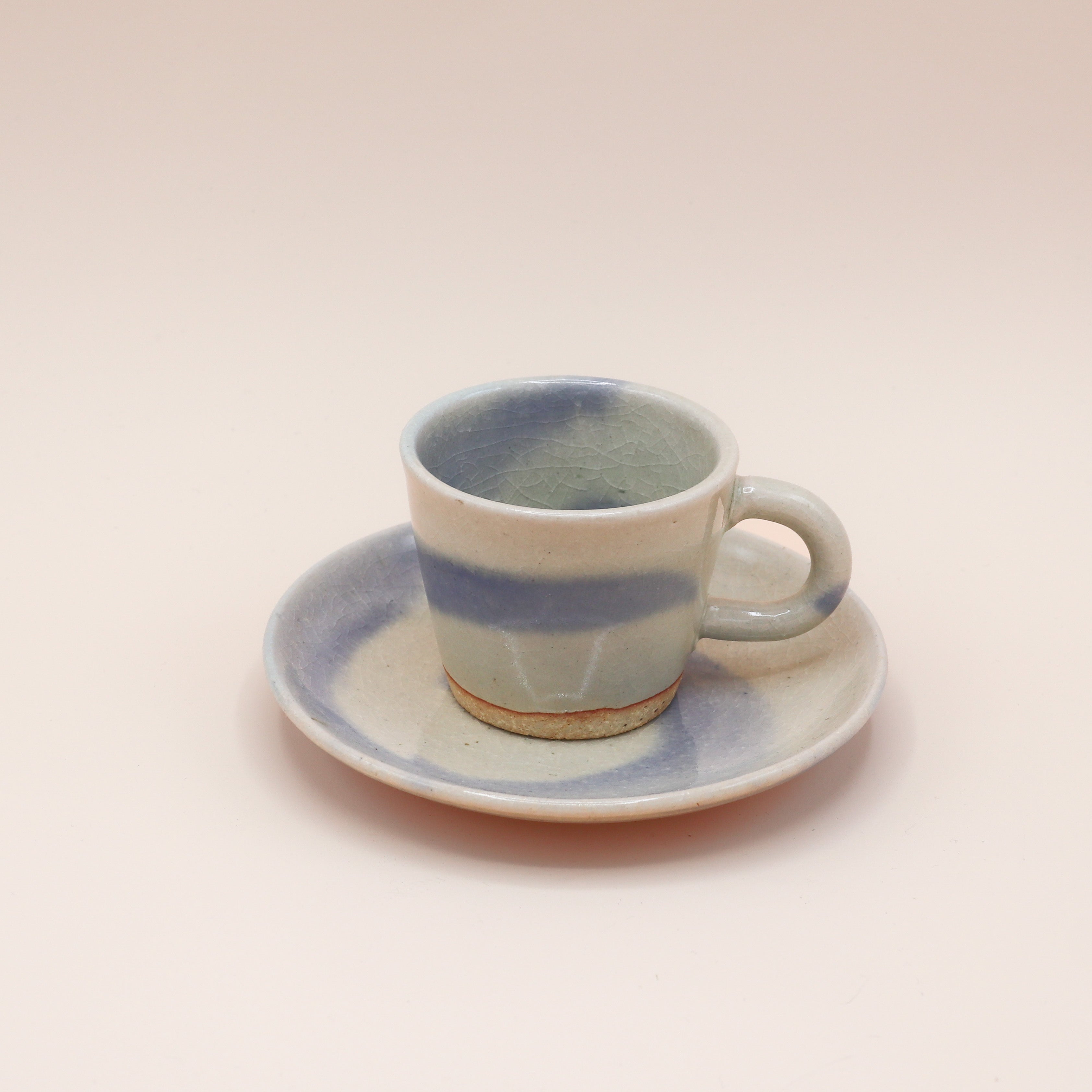 Kop med underkop i blå nuancer