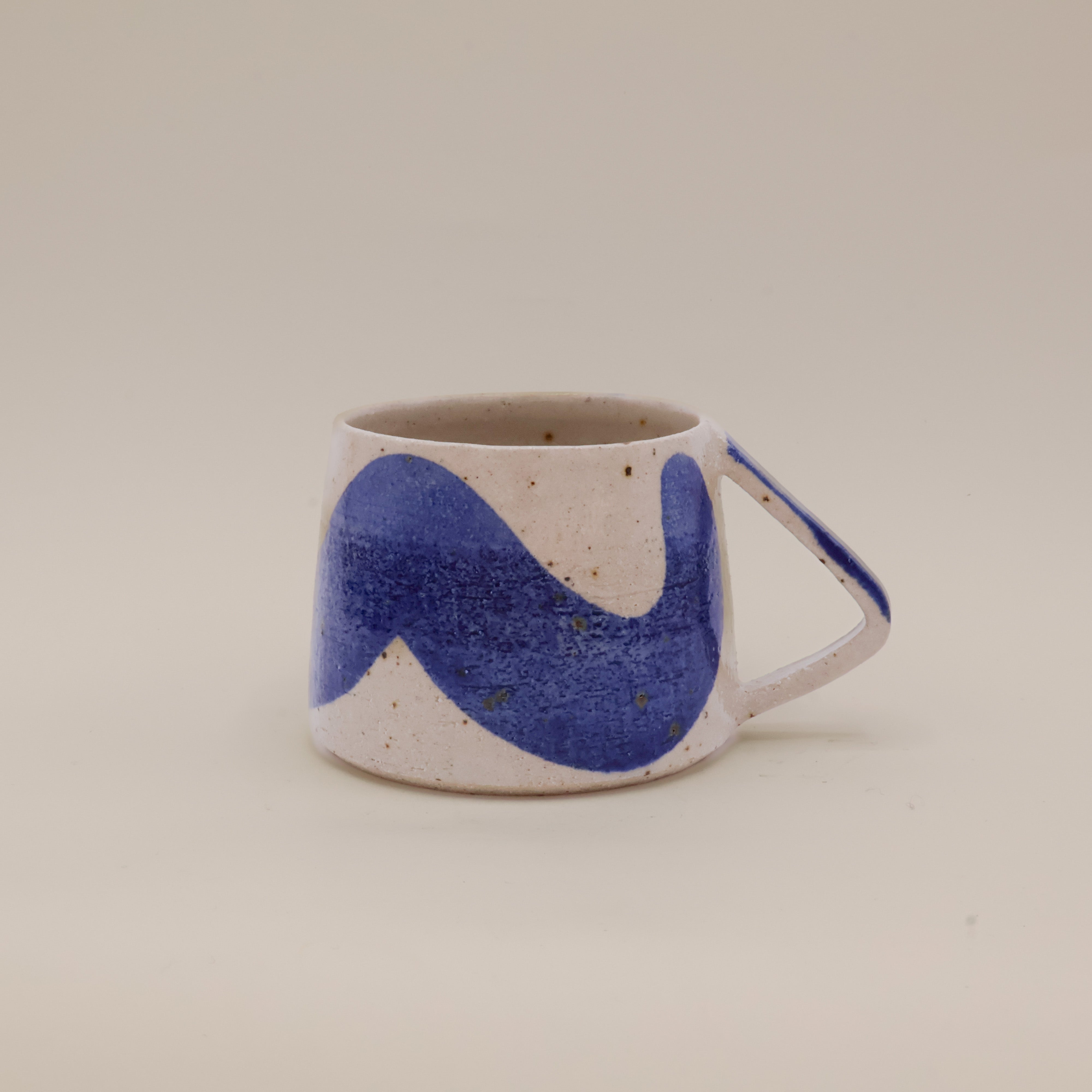 Wavy kop med blå bølge