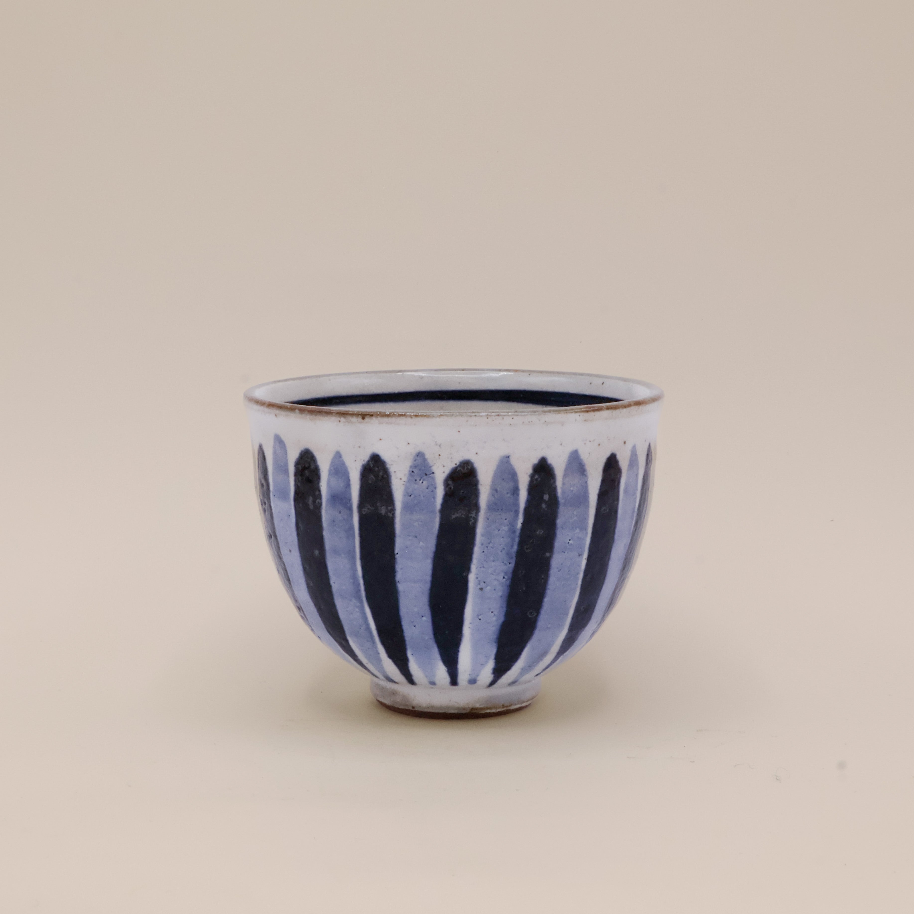 Handmade Japanese cup with blue stripes