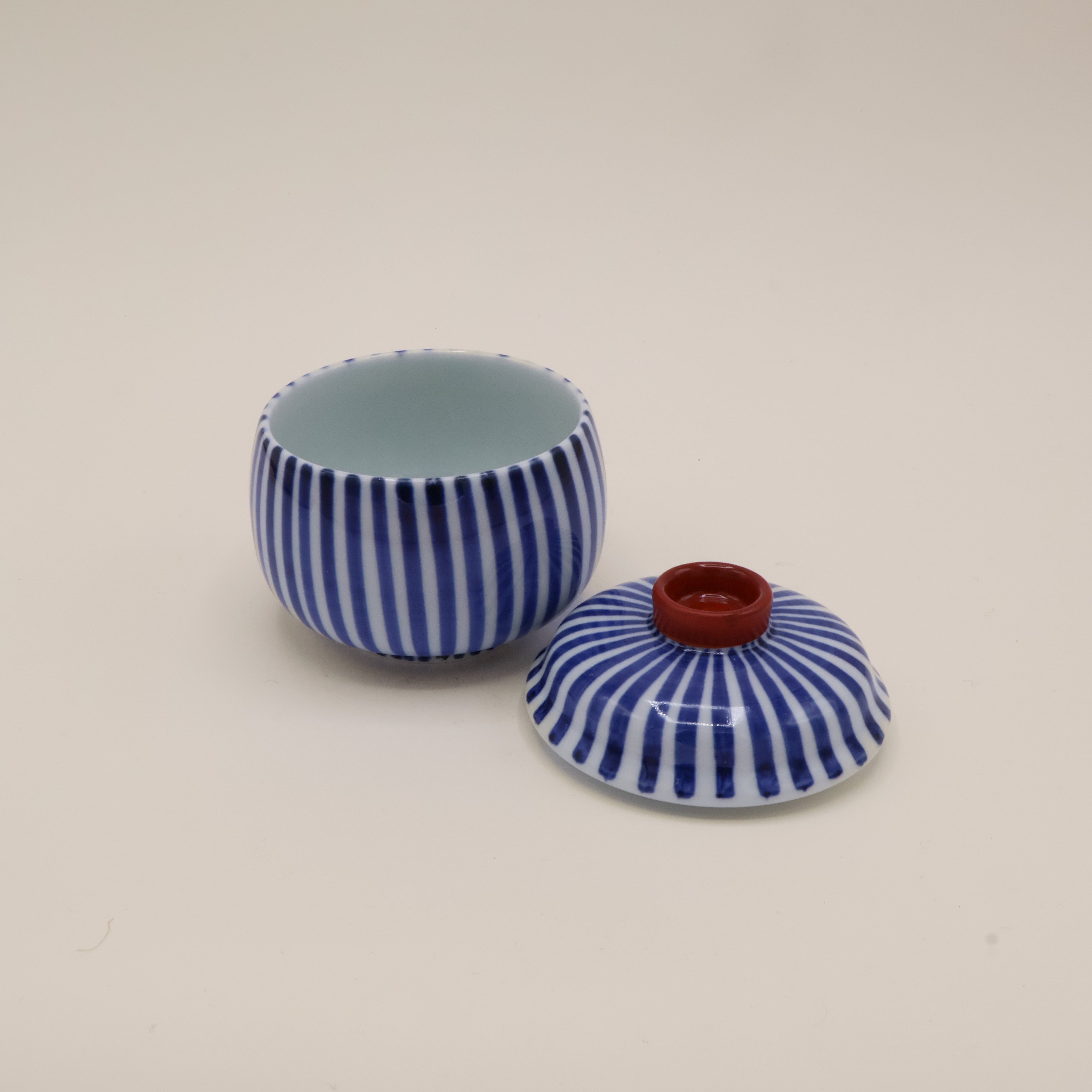 Jar with lid - Blue stripes and red top