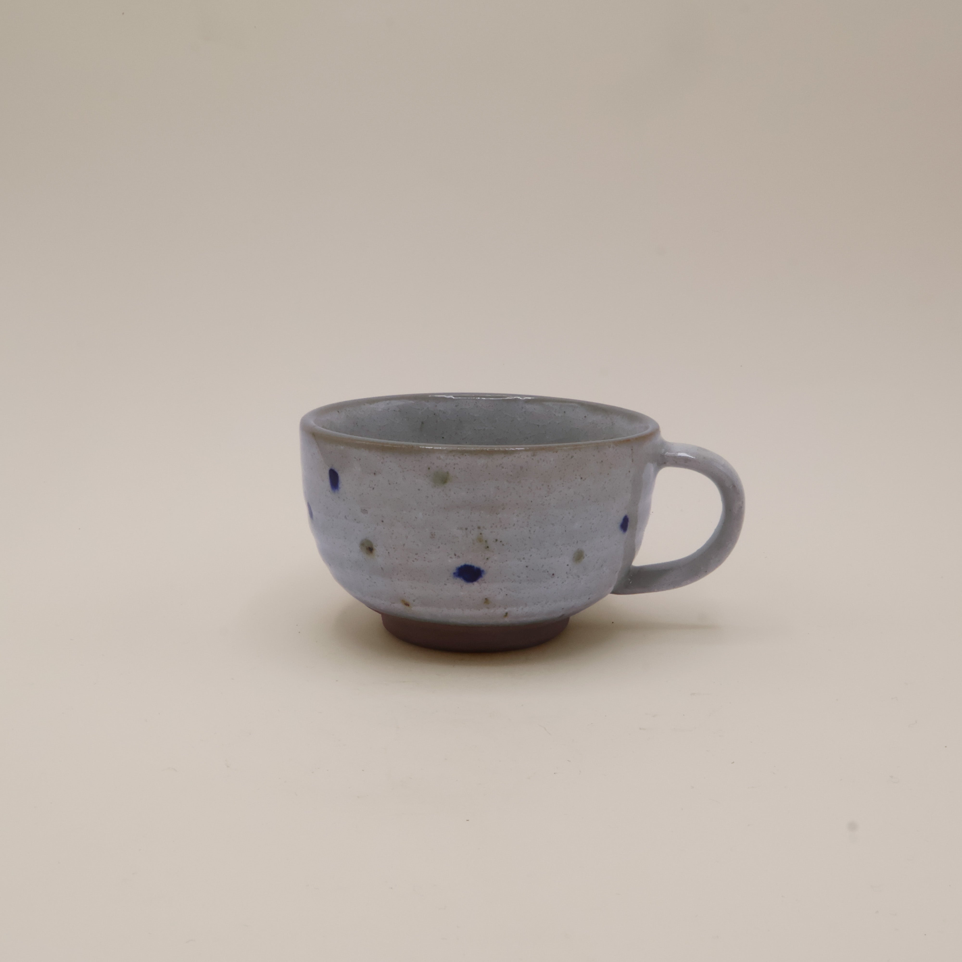 Cappuccino cup with dots