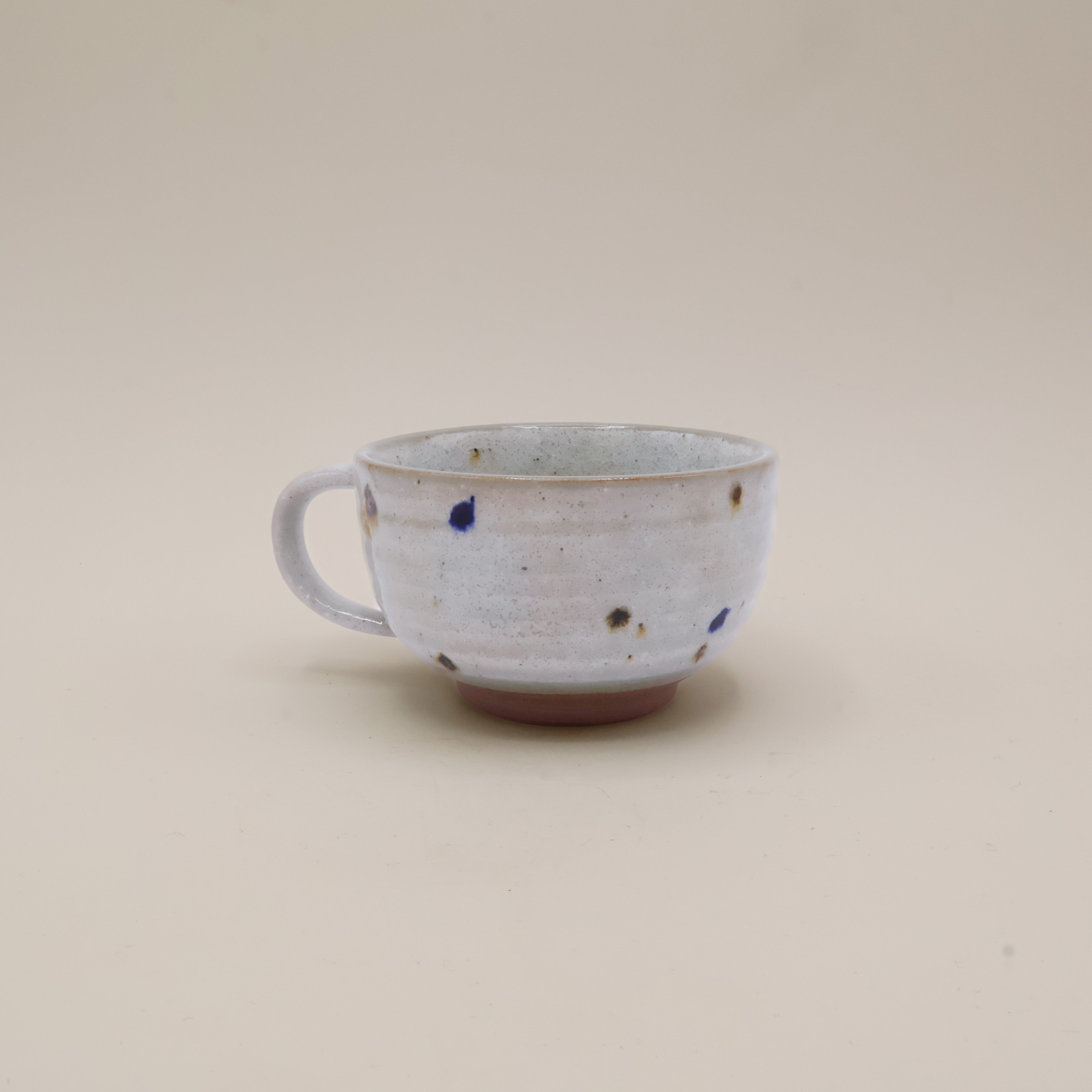 Cappuccino cup with dots