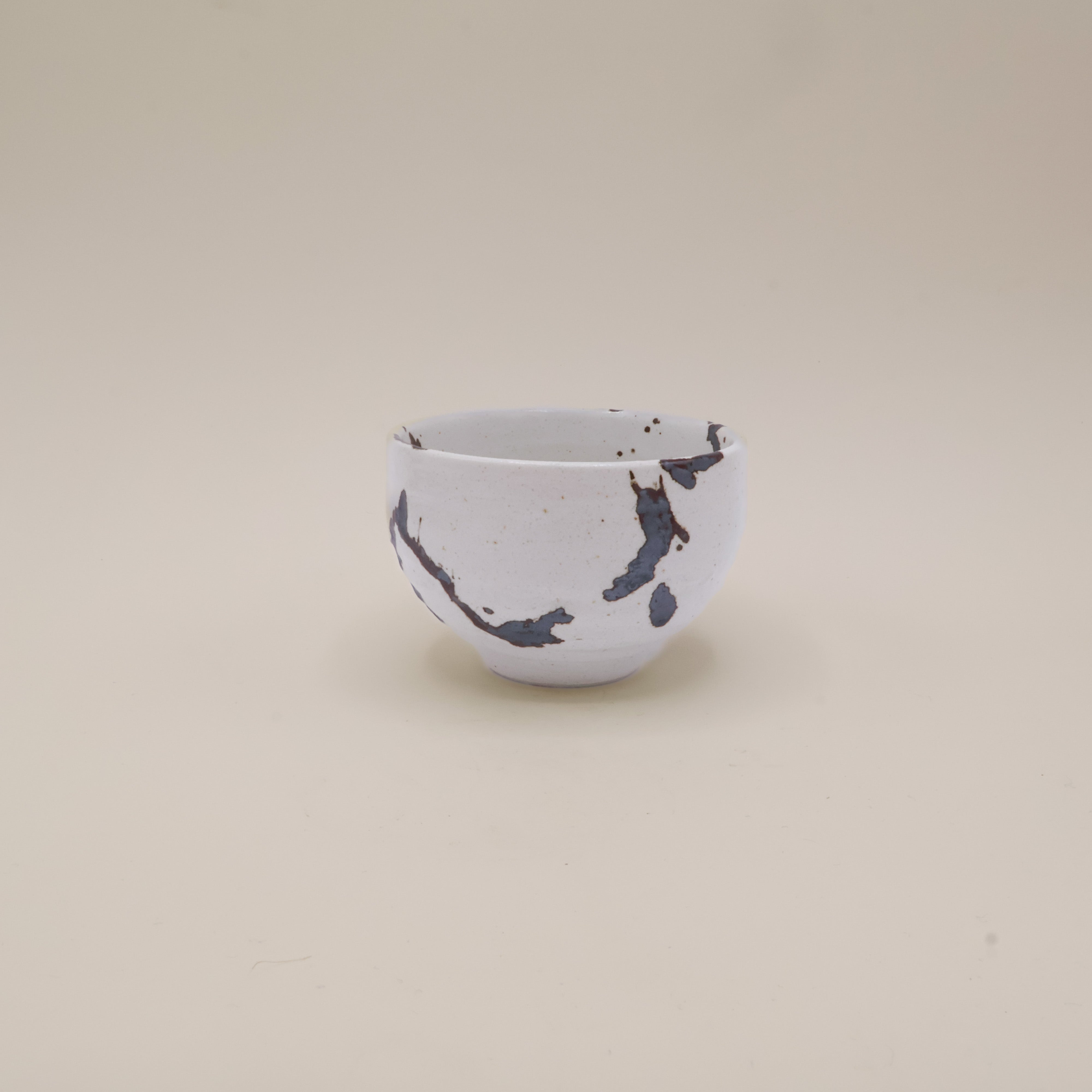 Japanese cup with brown metallic splash pattern