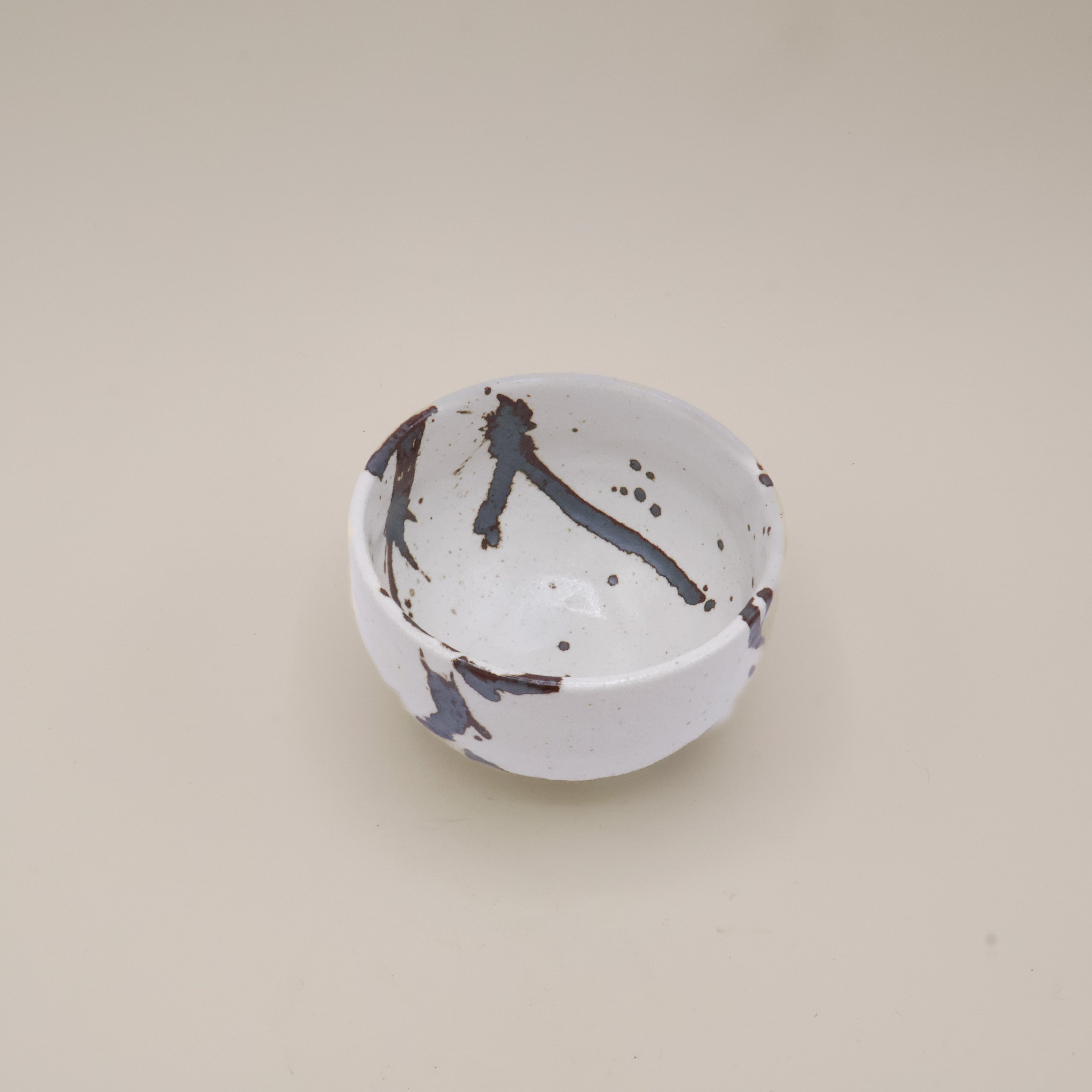 Japanese cup with brown metallic splash pattern