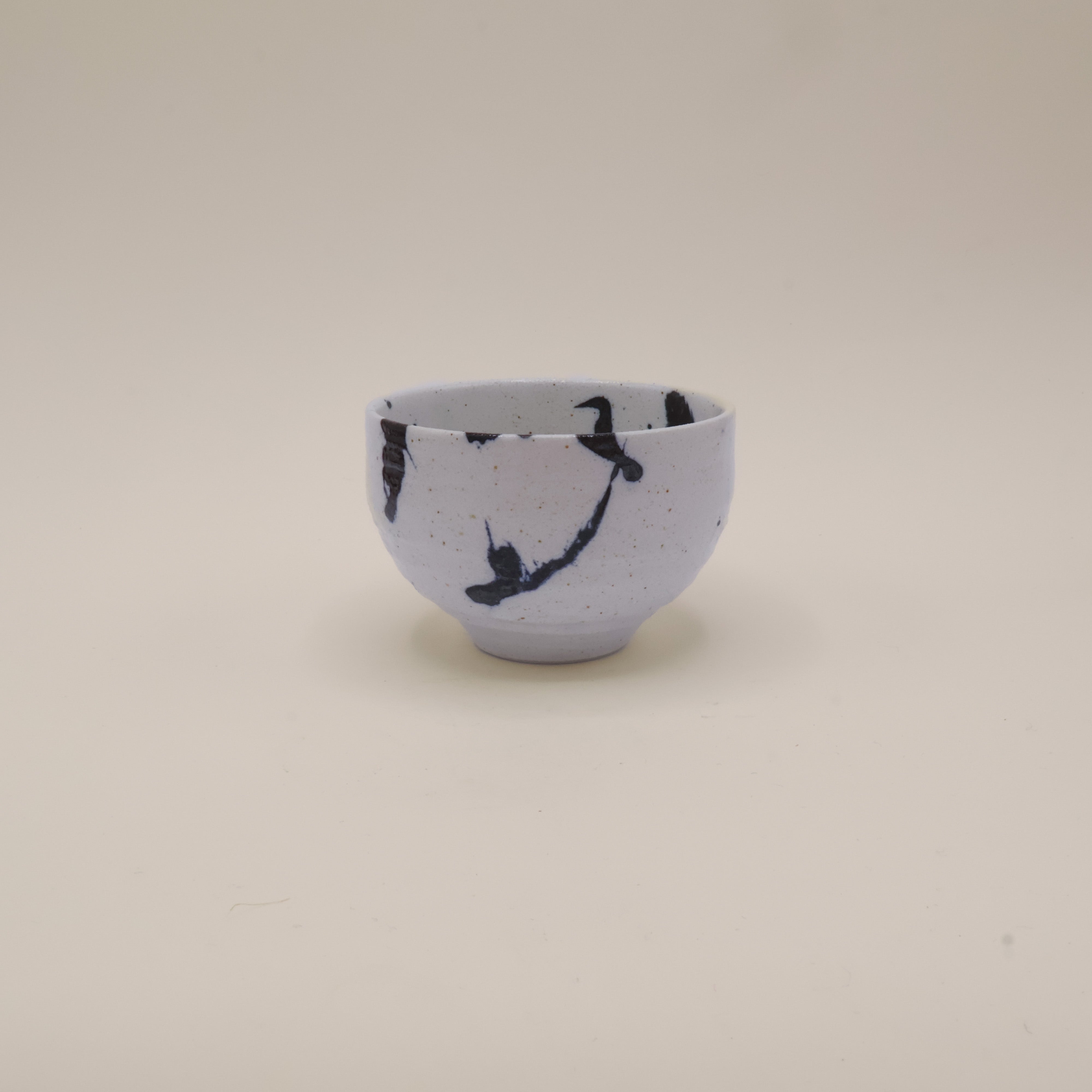 Japanese cup with blue splash pattern