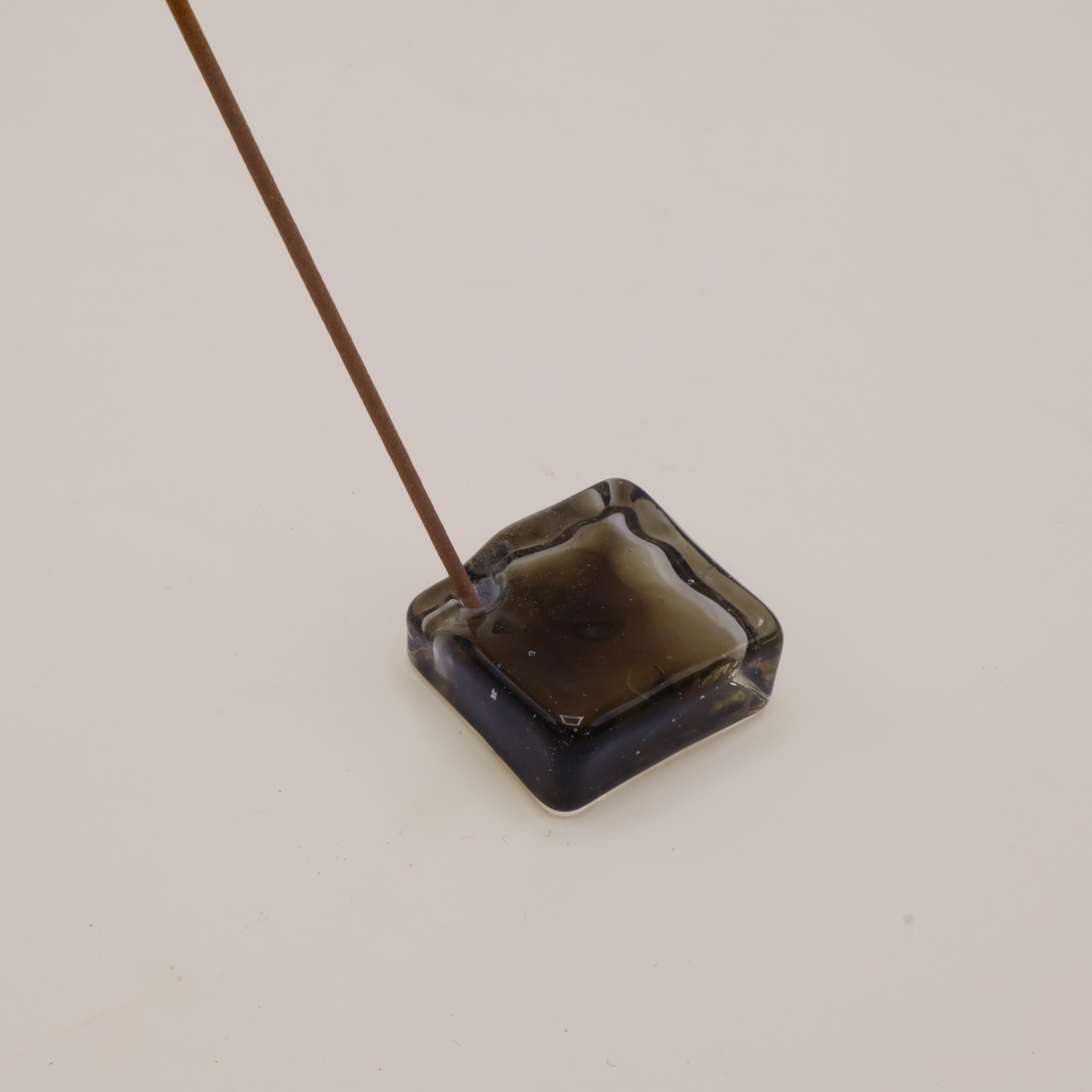 Brown glass incense holder
