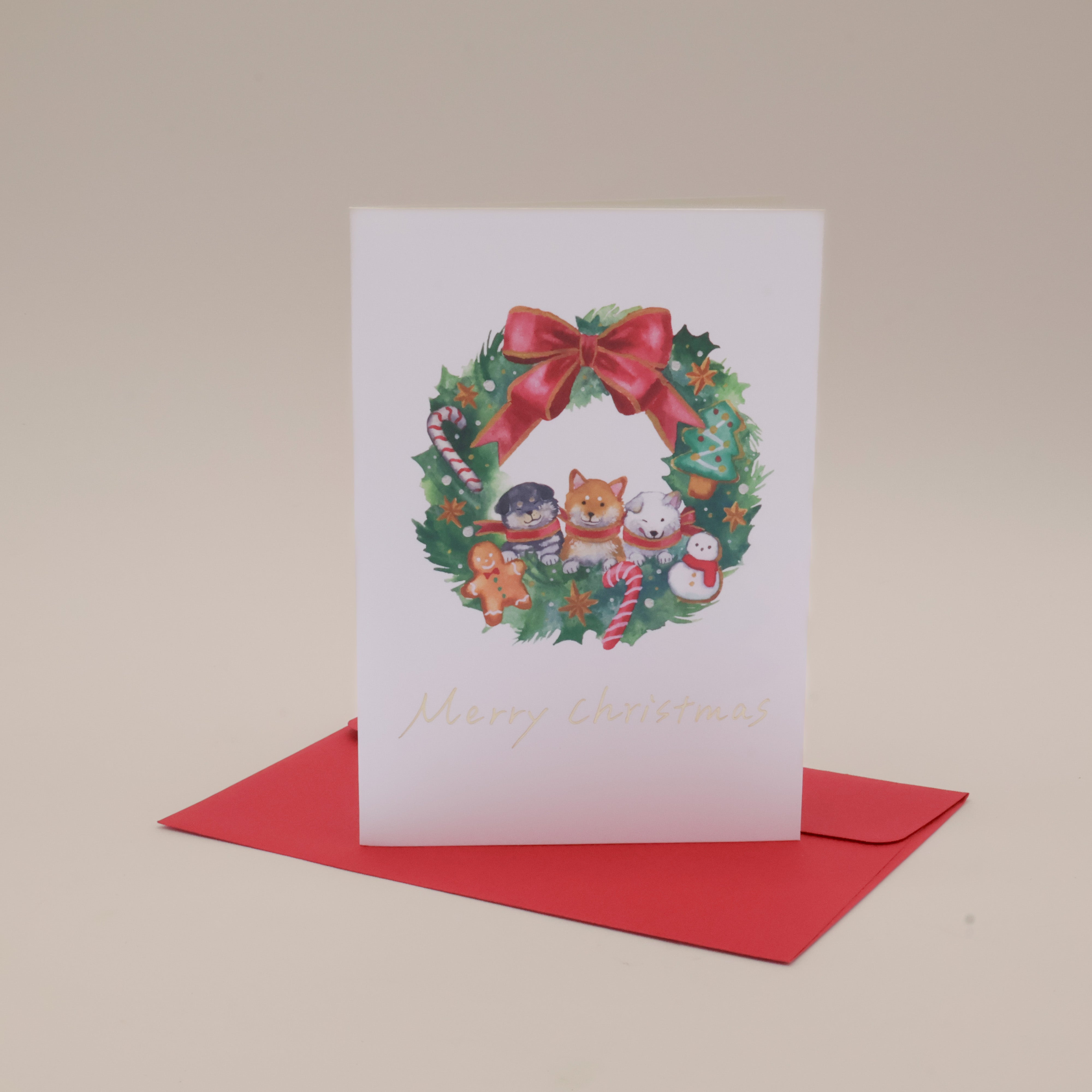 Julekort og kuvert med shibaer i adventskrans