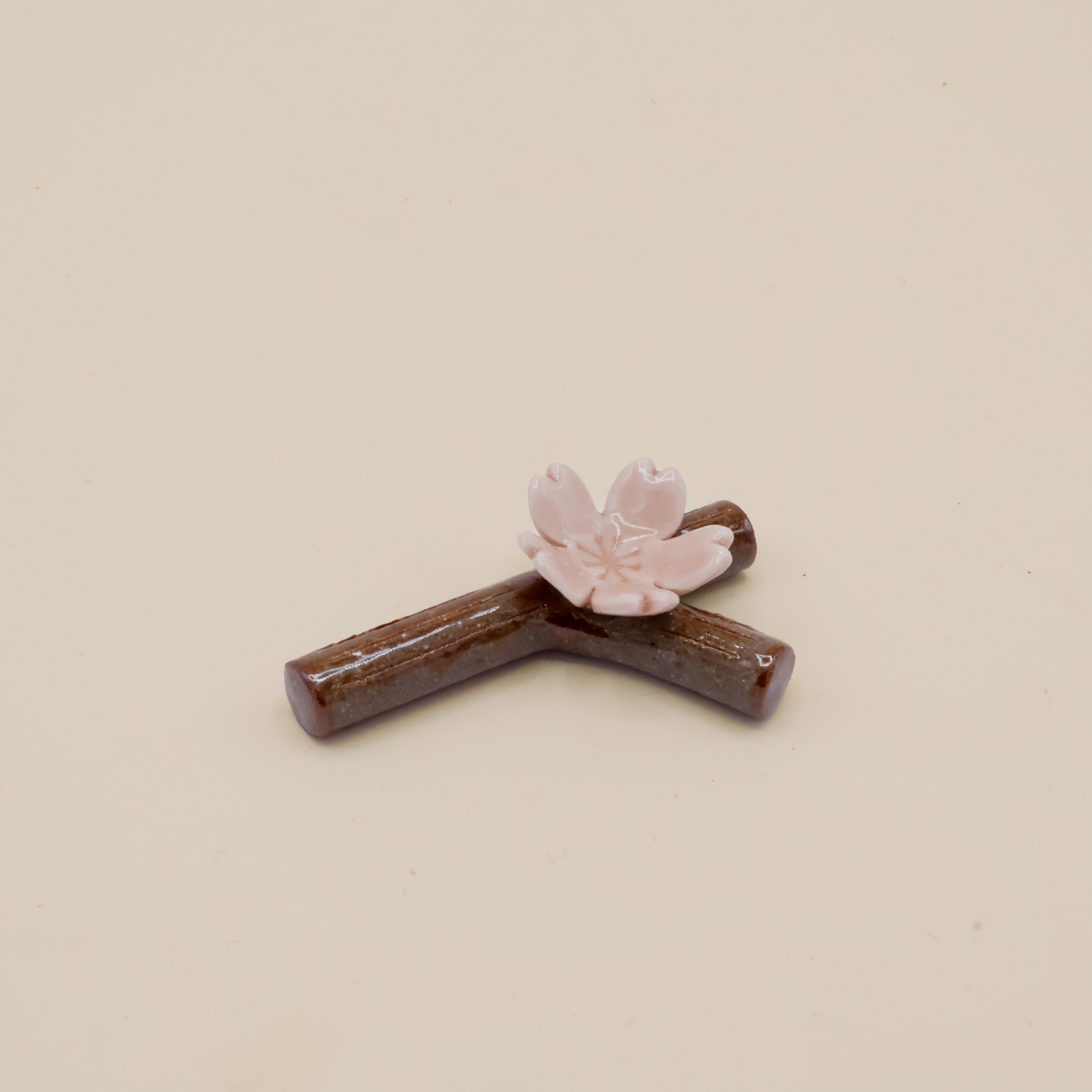 Spisepindeholder - Gren med sakura blomst