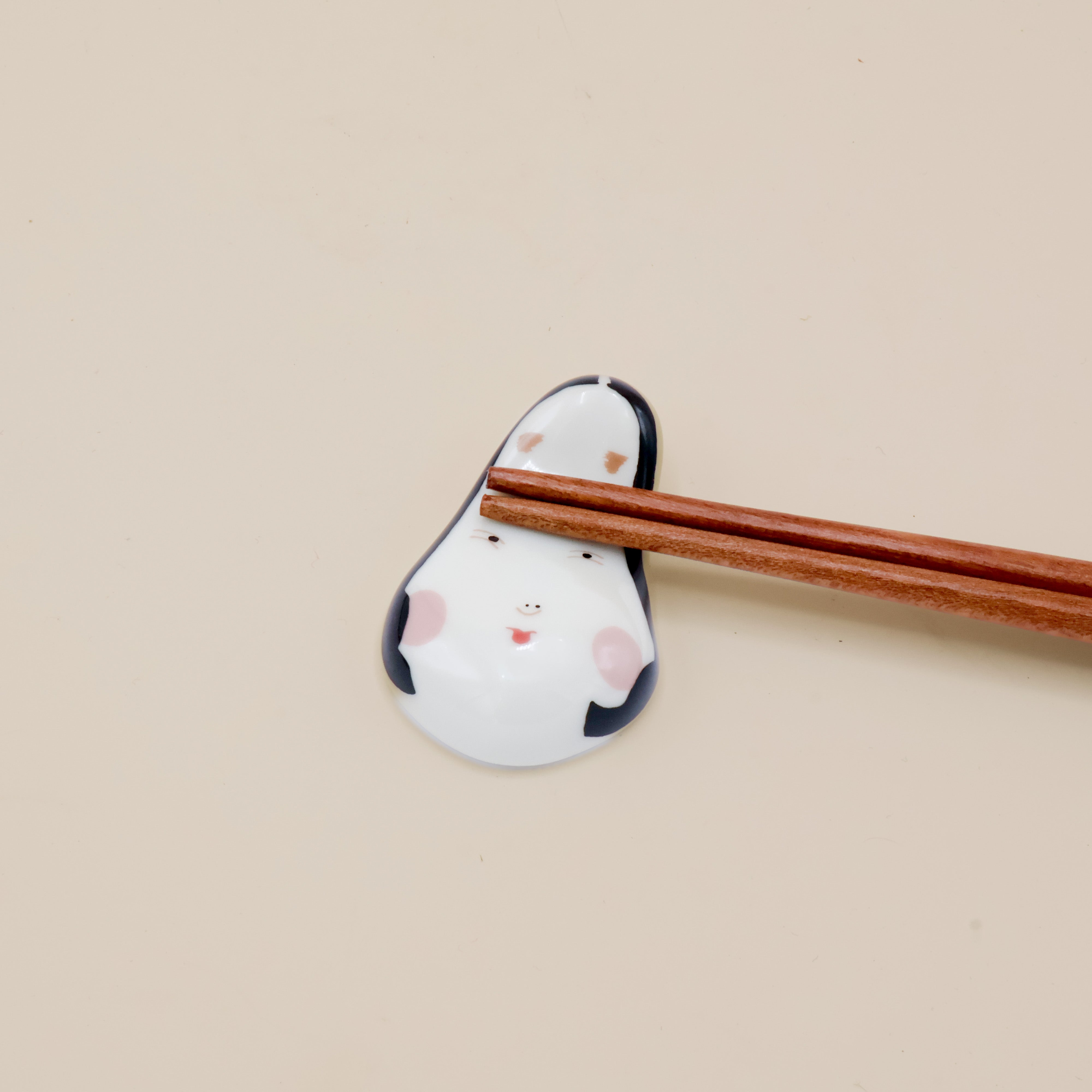 Chopstick holder - Elongated face